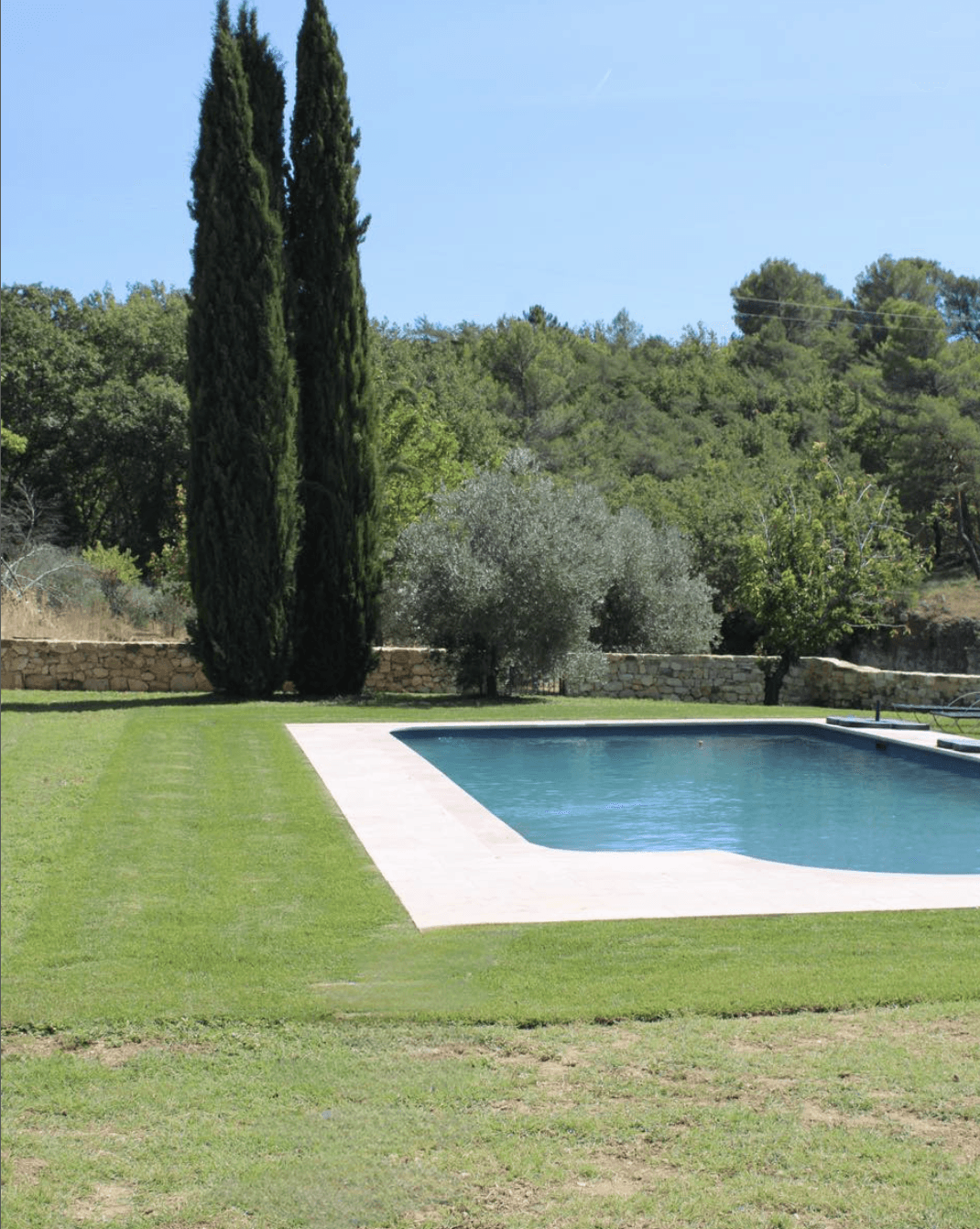 Stairway leads up to a wooden ceiling.
