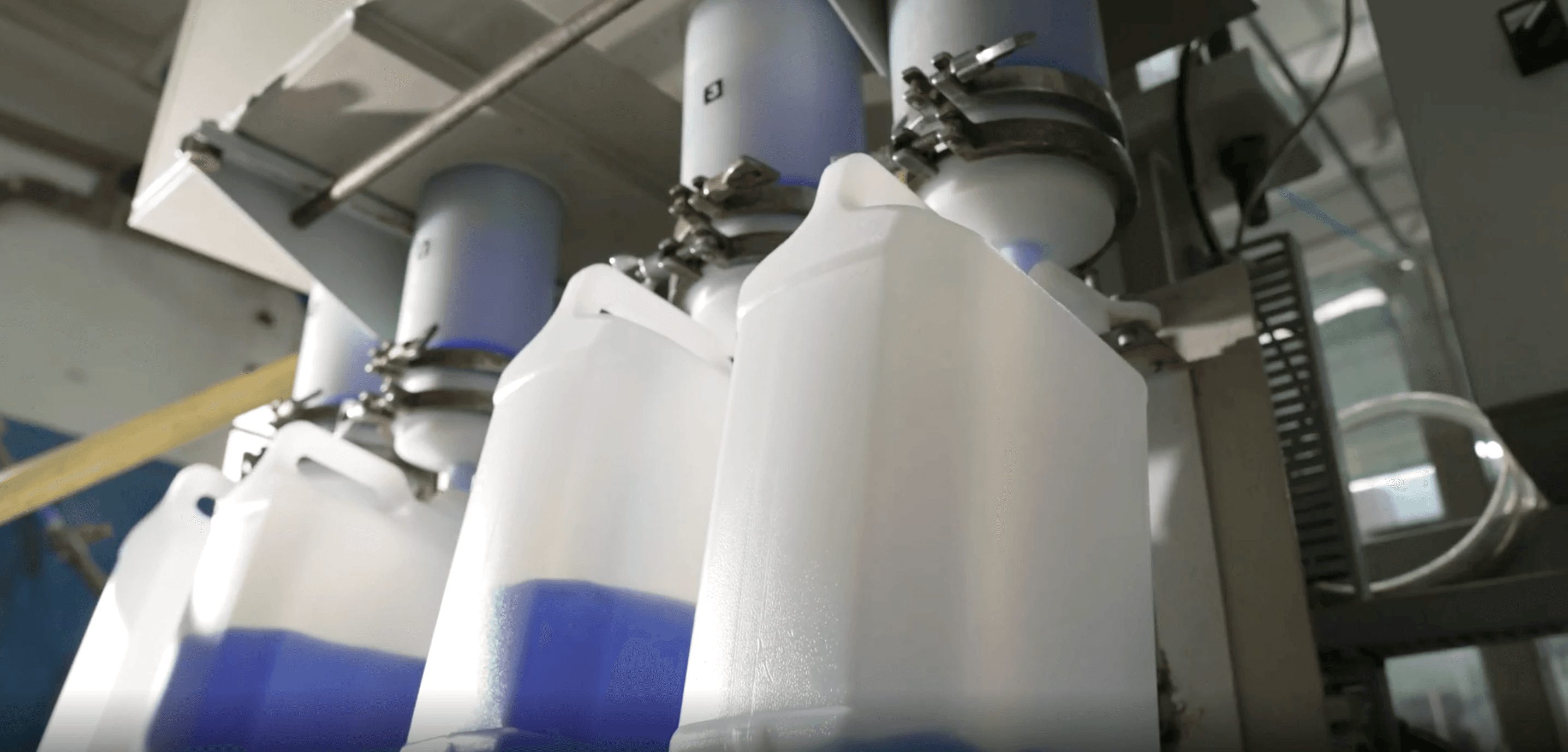 Lab technician kept a small chemical bottle in a stand
