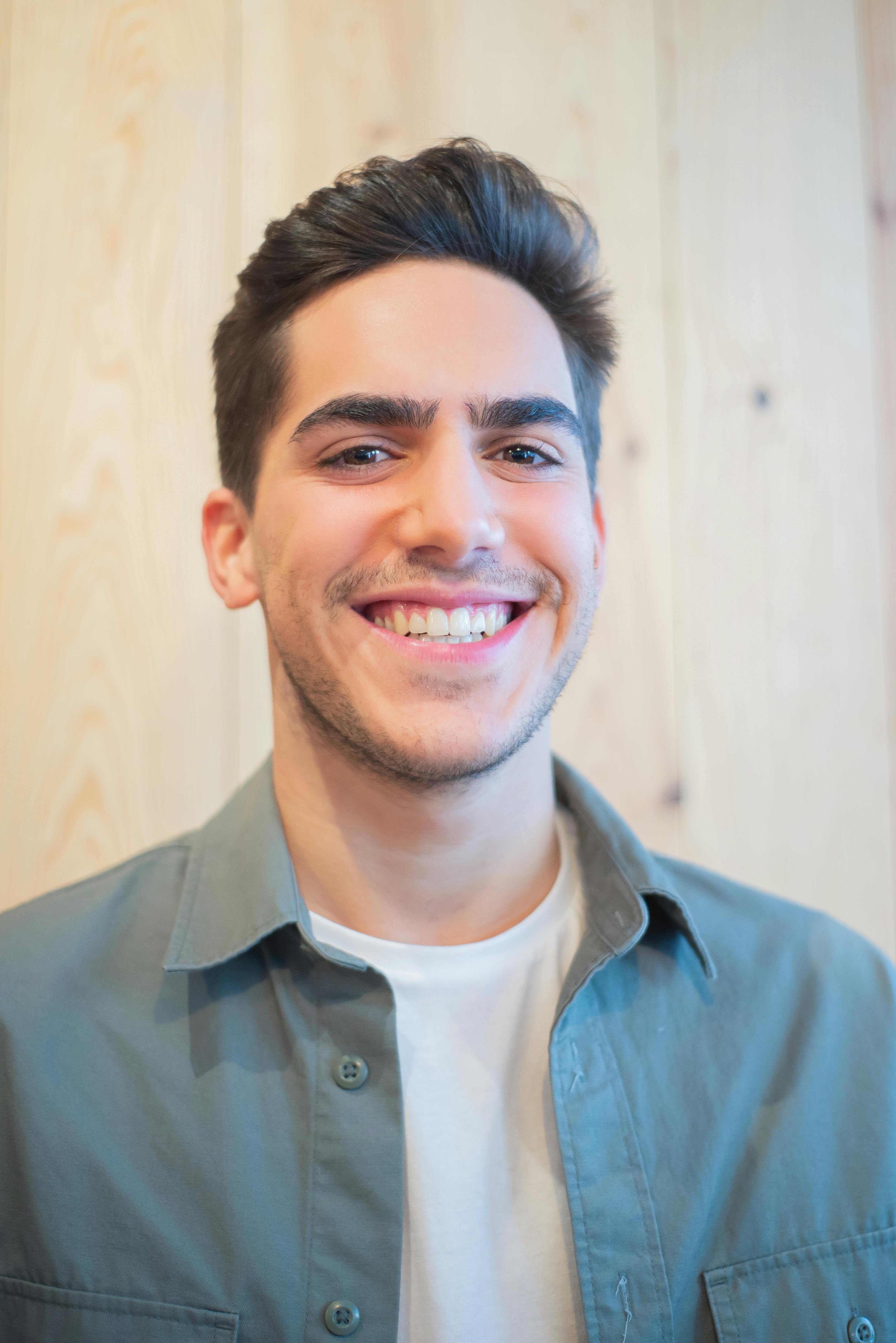Smiling young man portrait with casual outfit