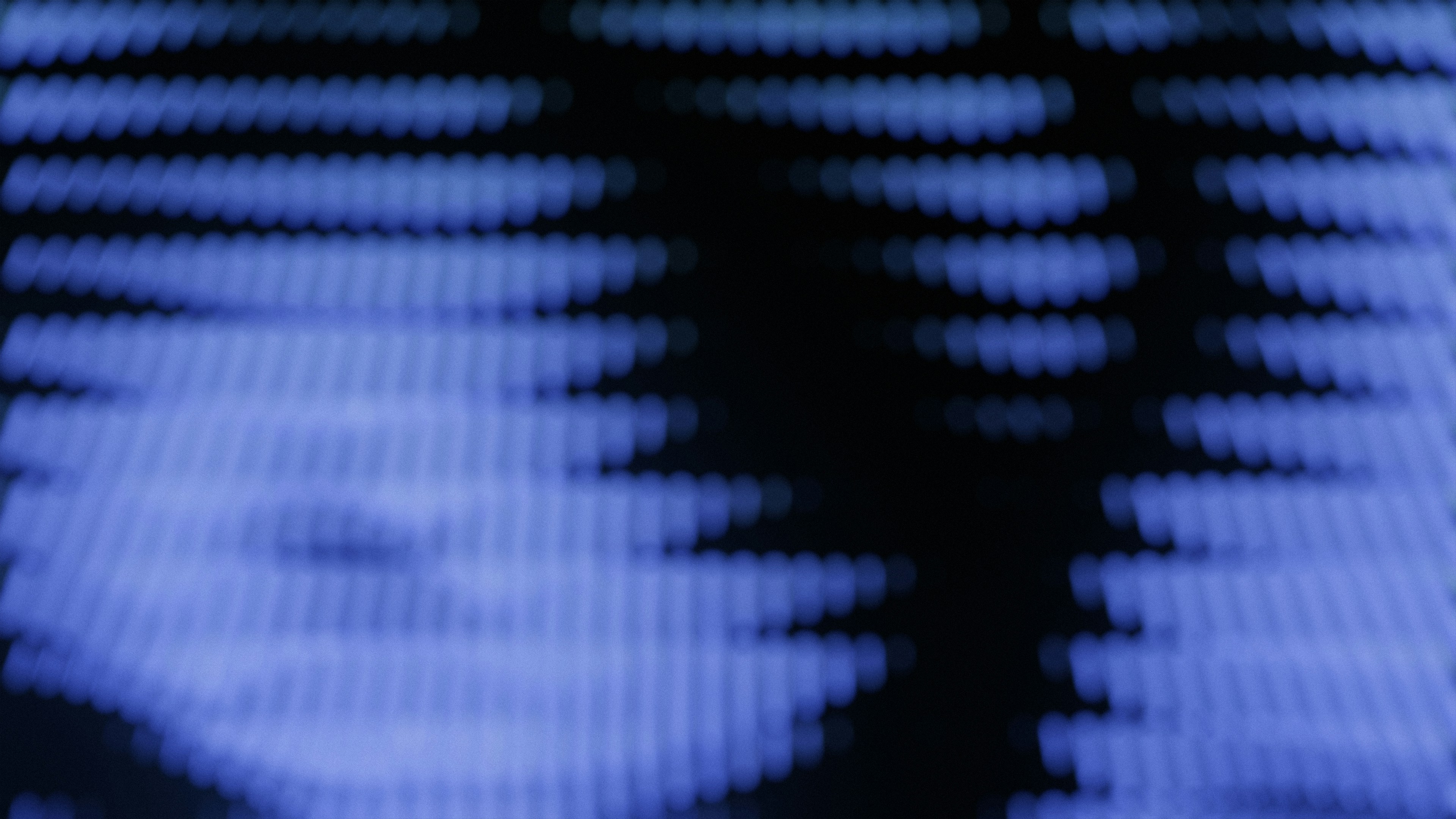 silhouette photo of person holding smartphone