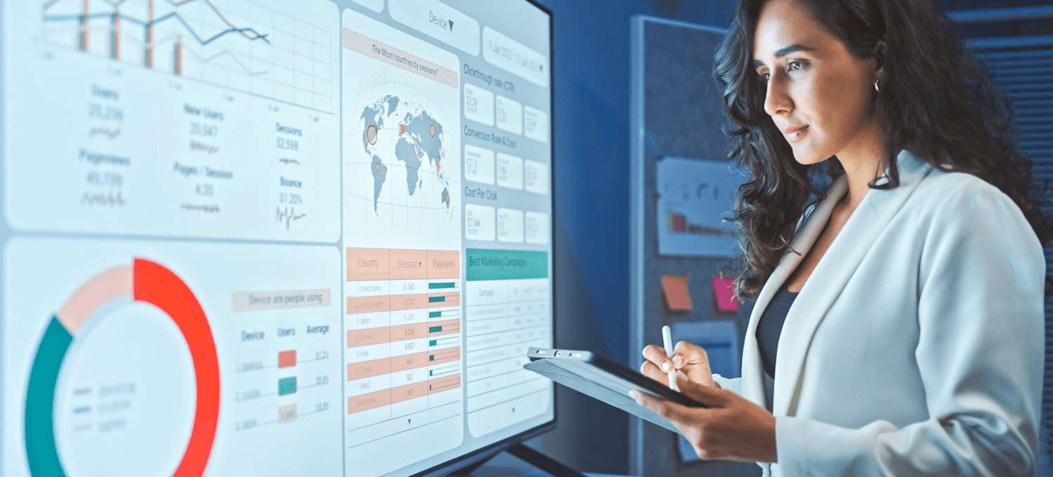 Woman analyzing data dashboard - Accounting Data Categorization