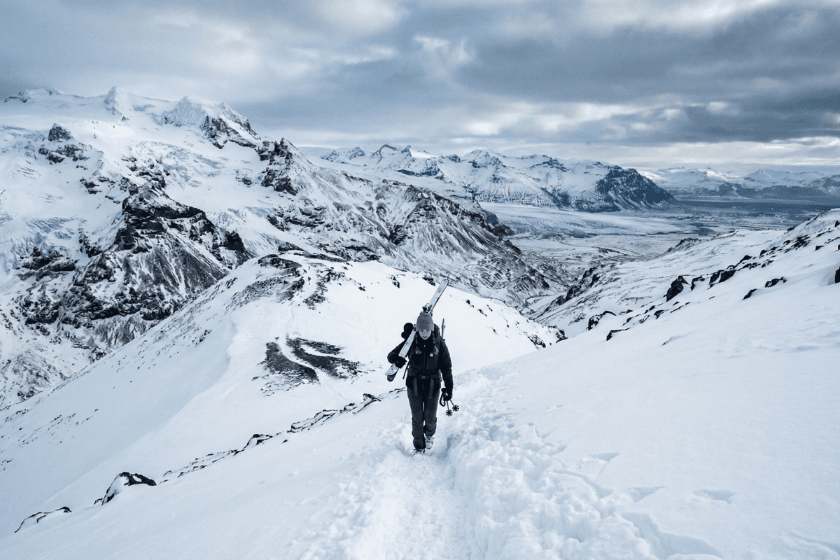 pair of white-and-orange athletic shoes on white box