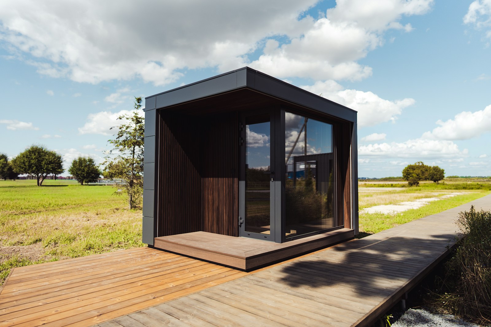 A small timber volume set on a raised deck