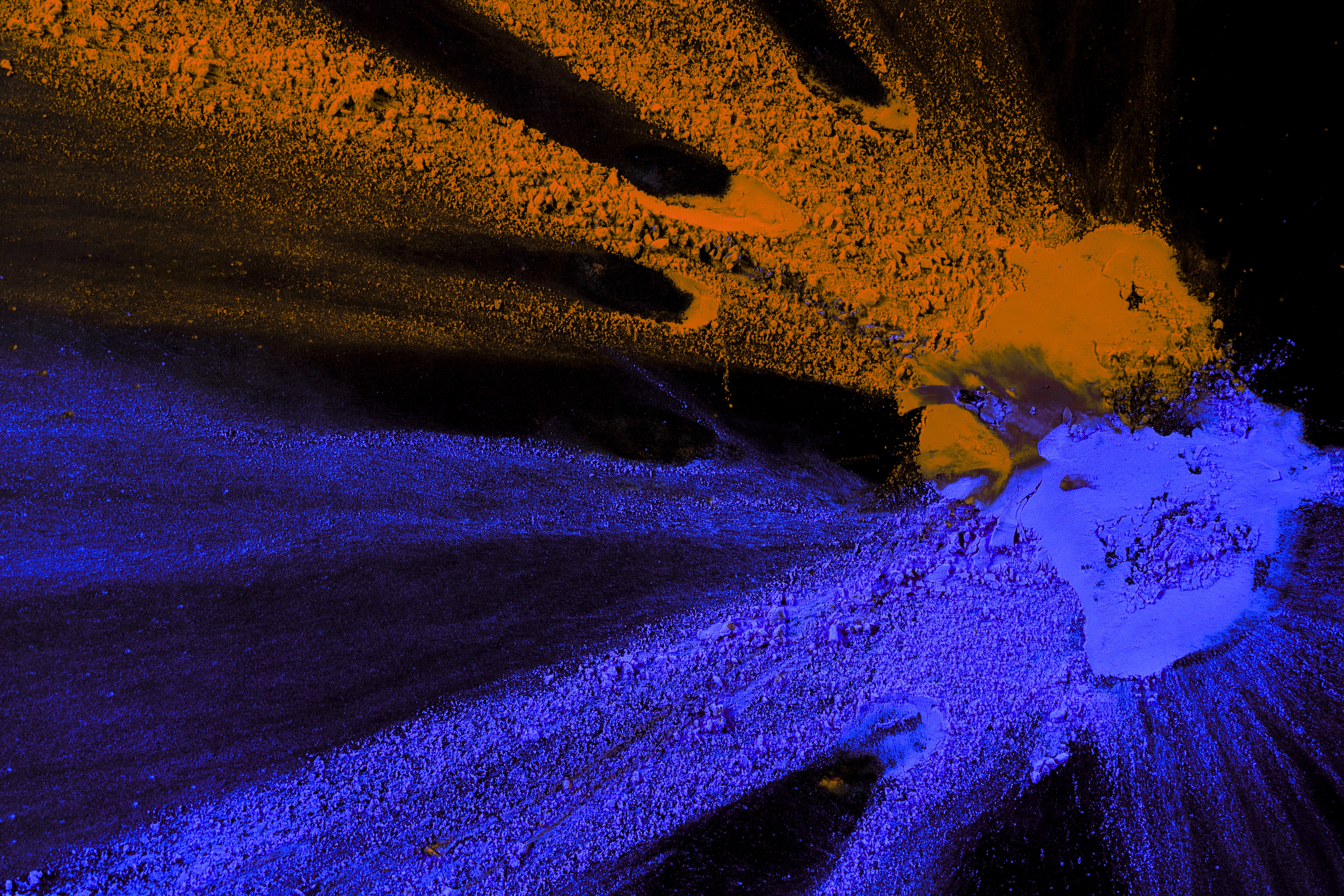 A figurative painting showing people gathered within an open field, combining symbolic text and soft forms to explore connection, presence, and shared space.