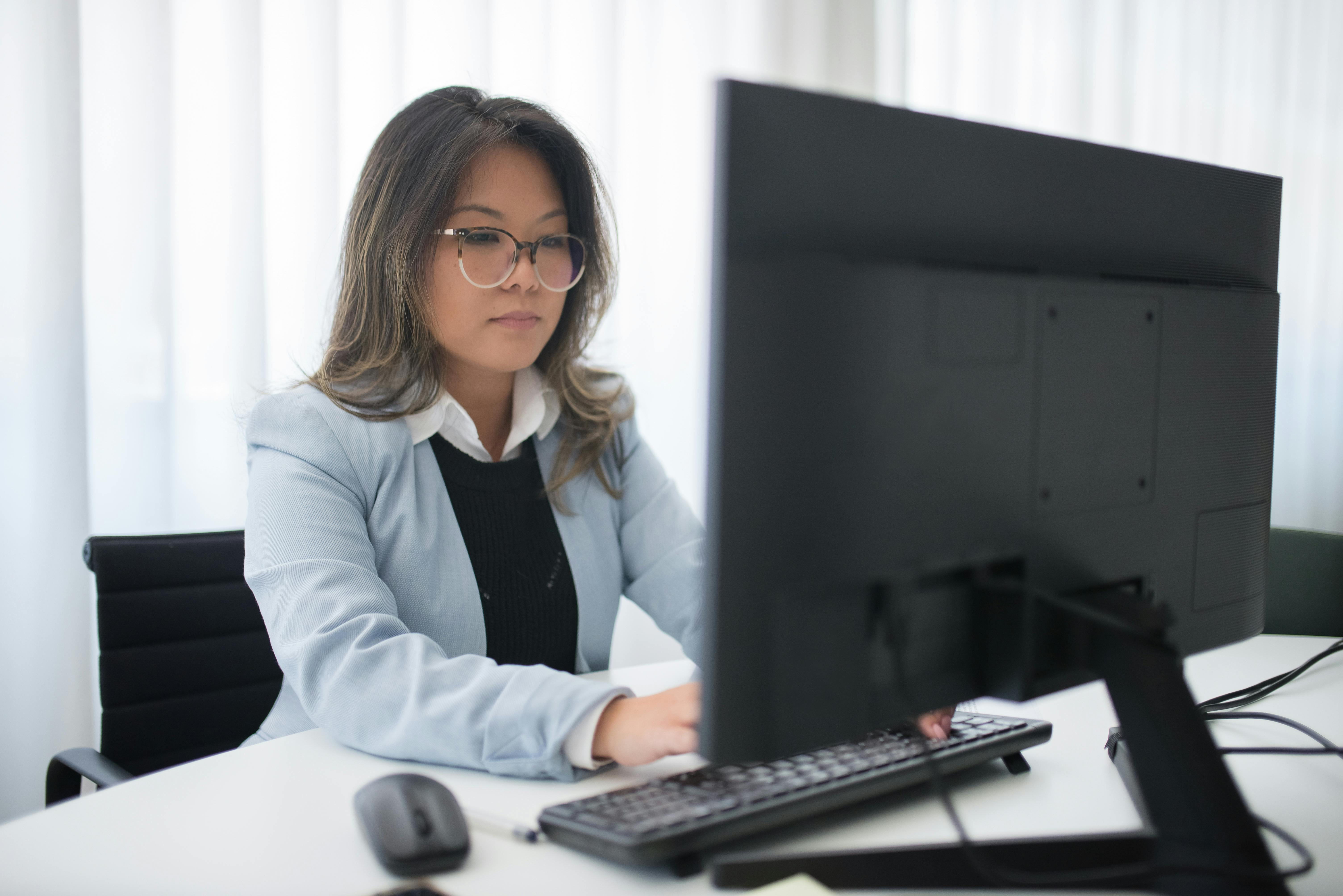 Top mortgage advisor typing on the computer