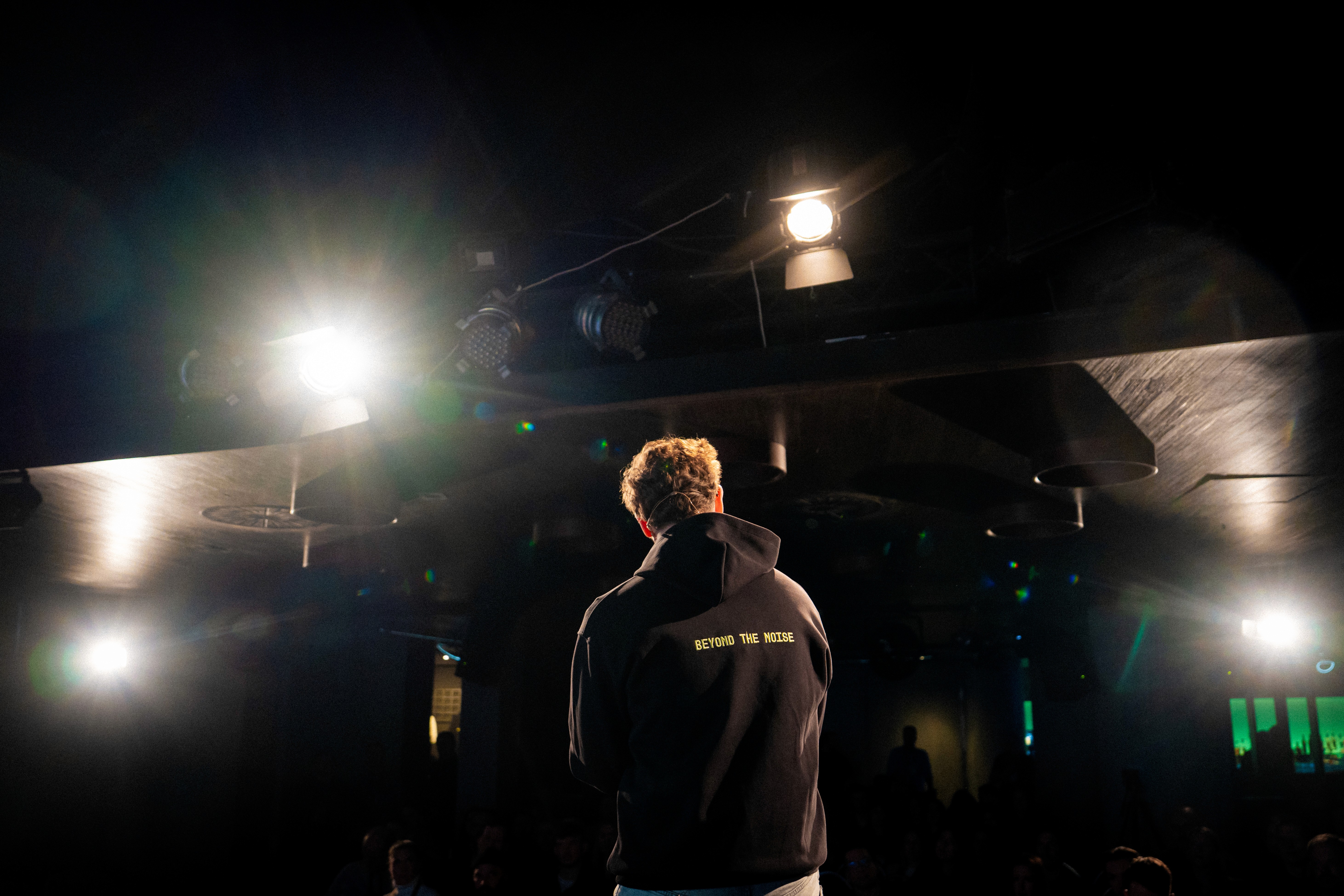 Person on Stage from the Background