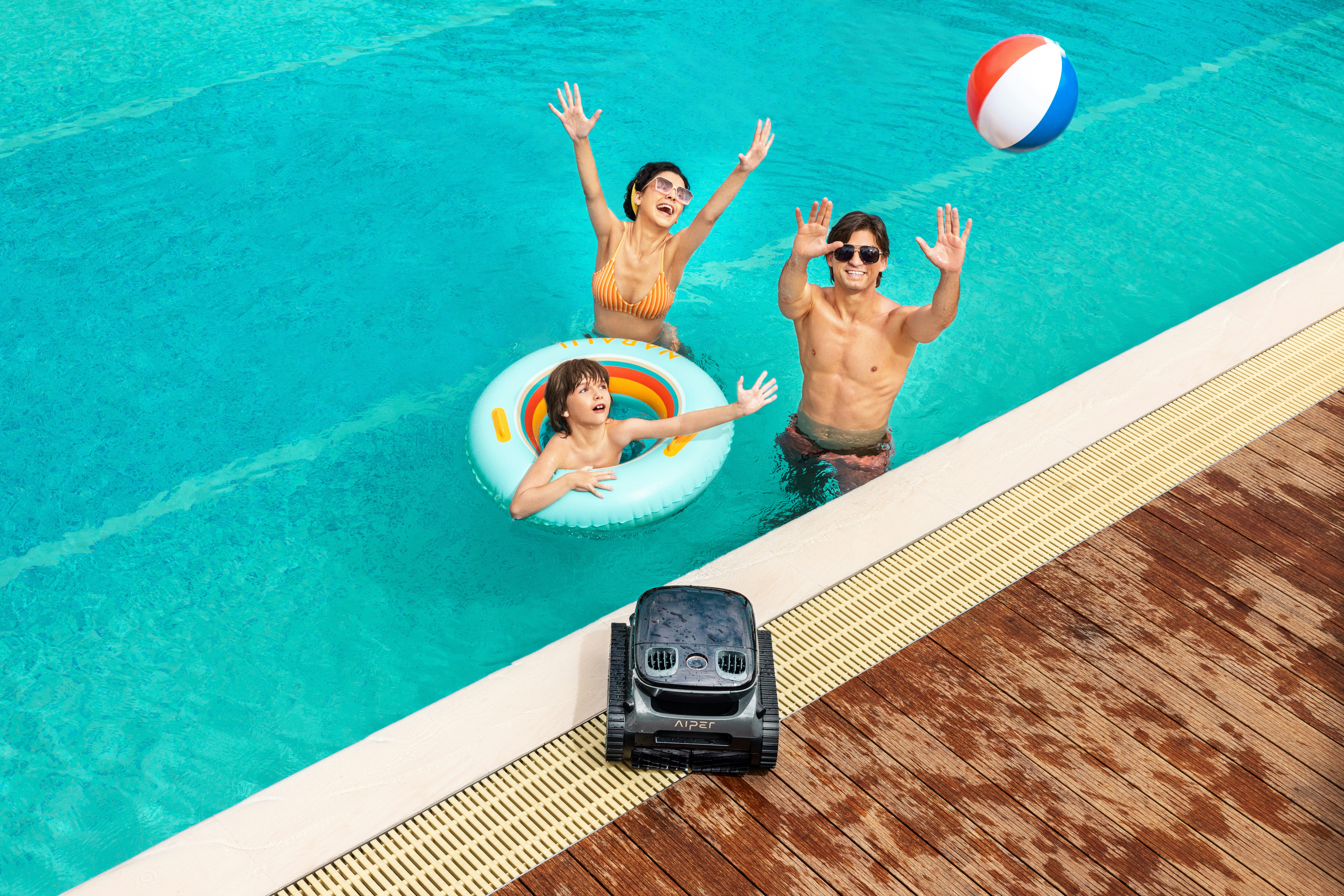 A couple of people that are in a pool