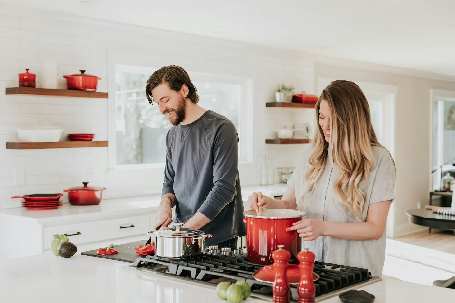 Couple preparing a healthy meal together in a bright modern kitchen