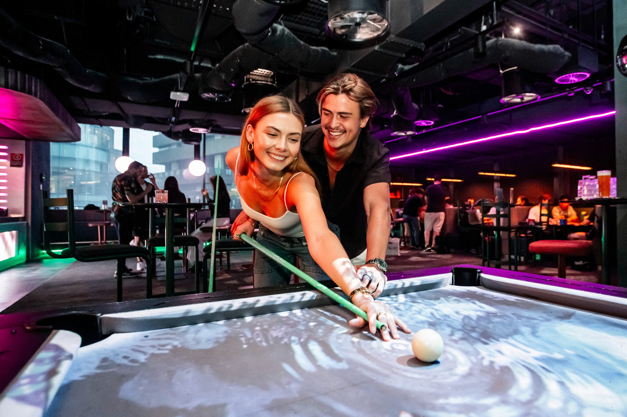 Couple play Pool