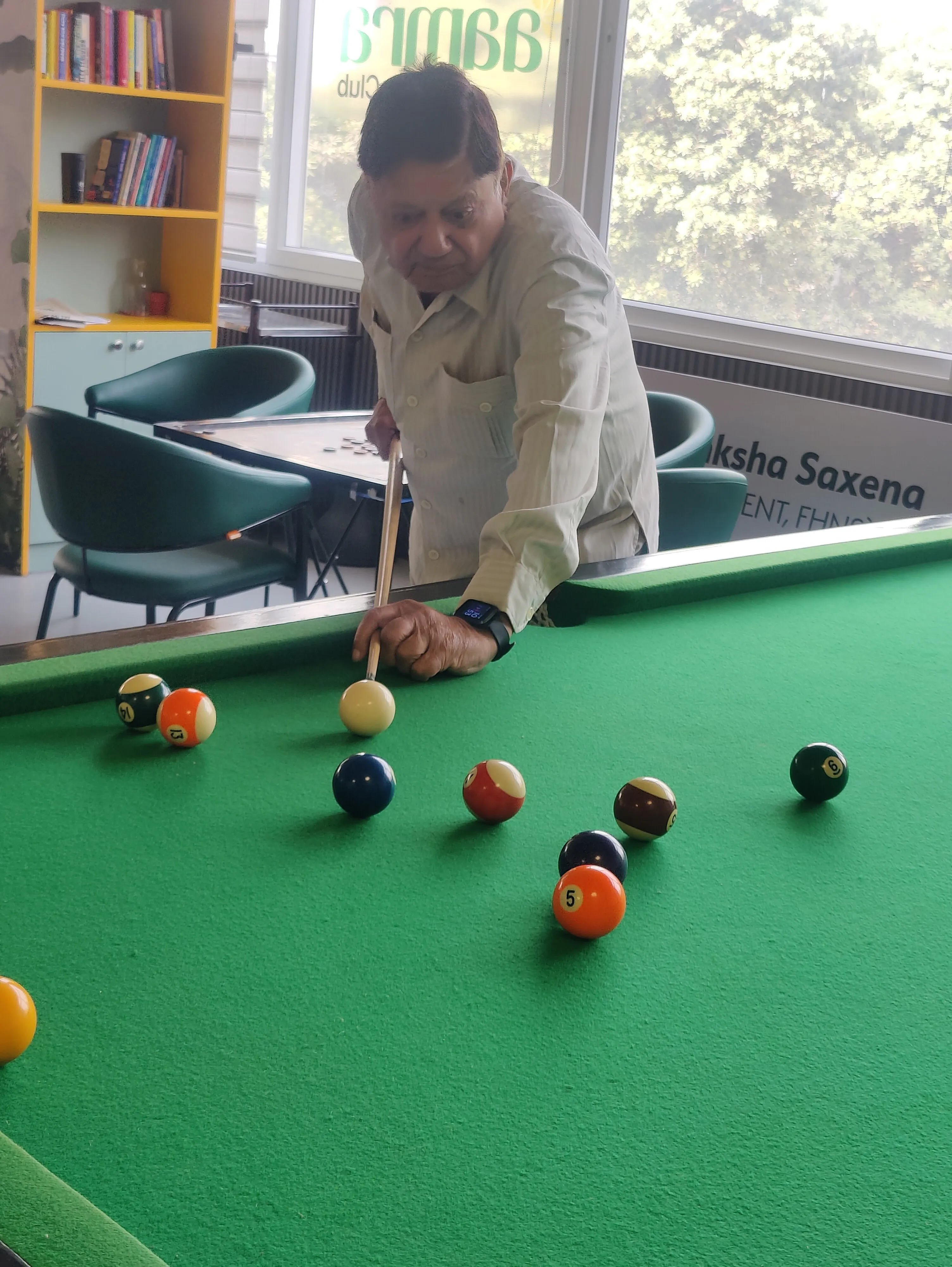 Member playing snooker at Aamra Seniors Club Gurgaon