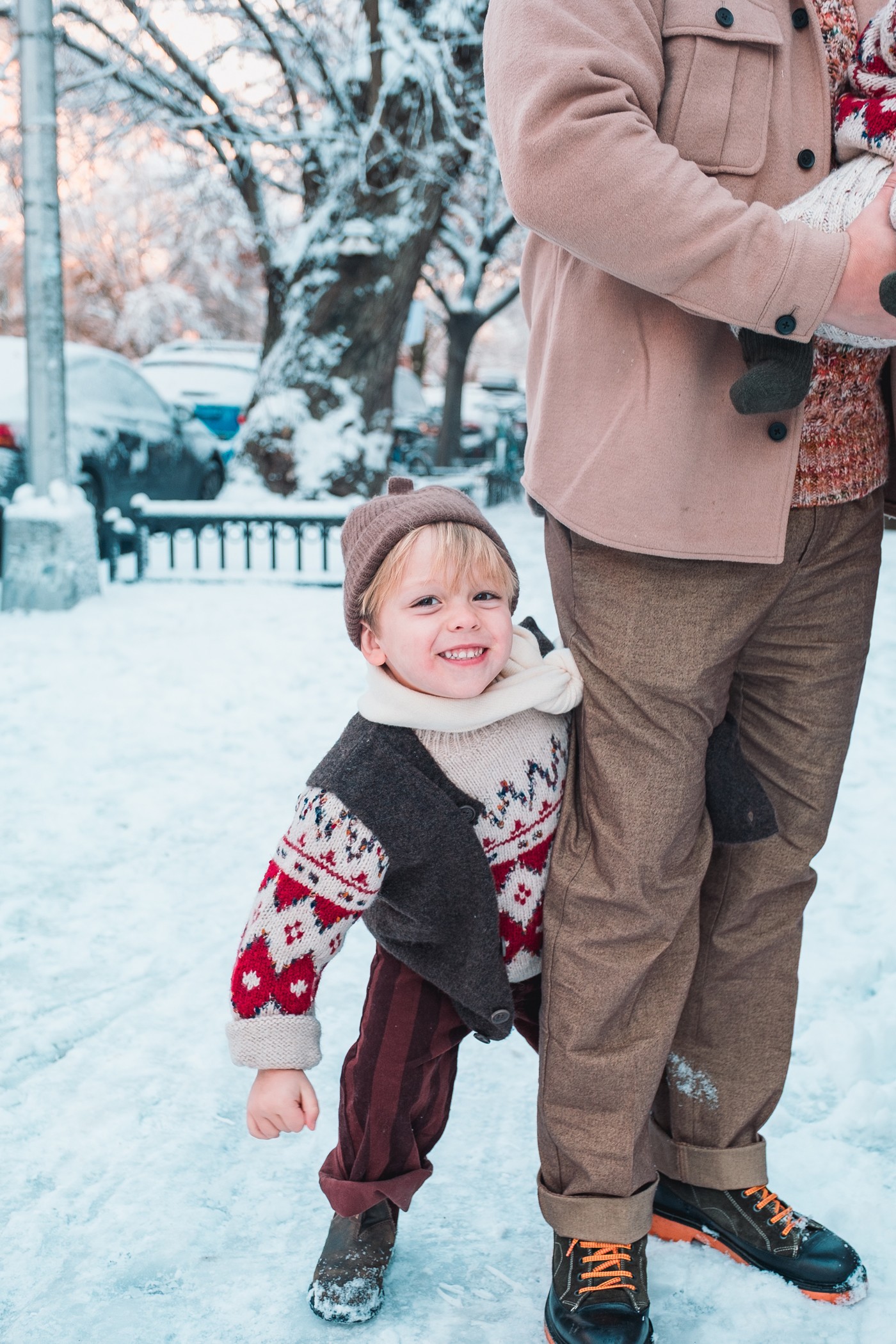 lifestyle-father-and-son-walking-winter-street-new-york
