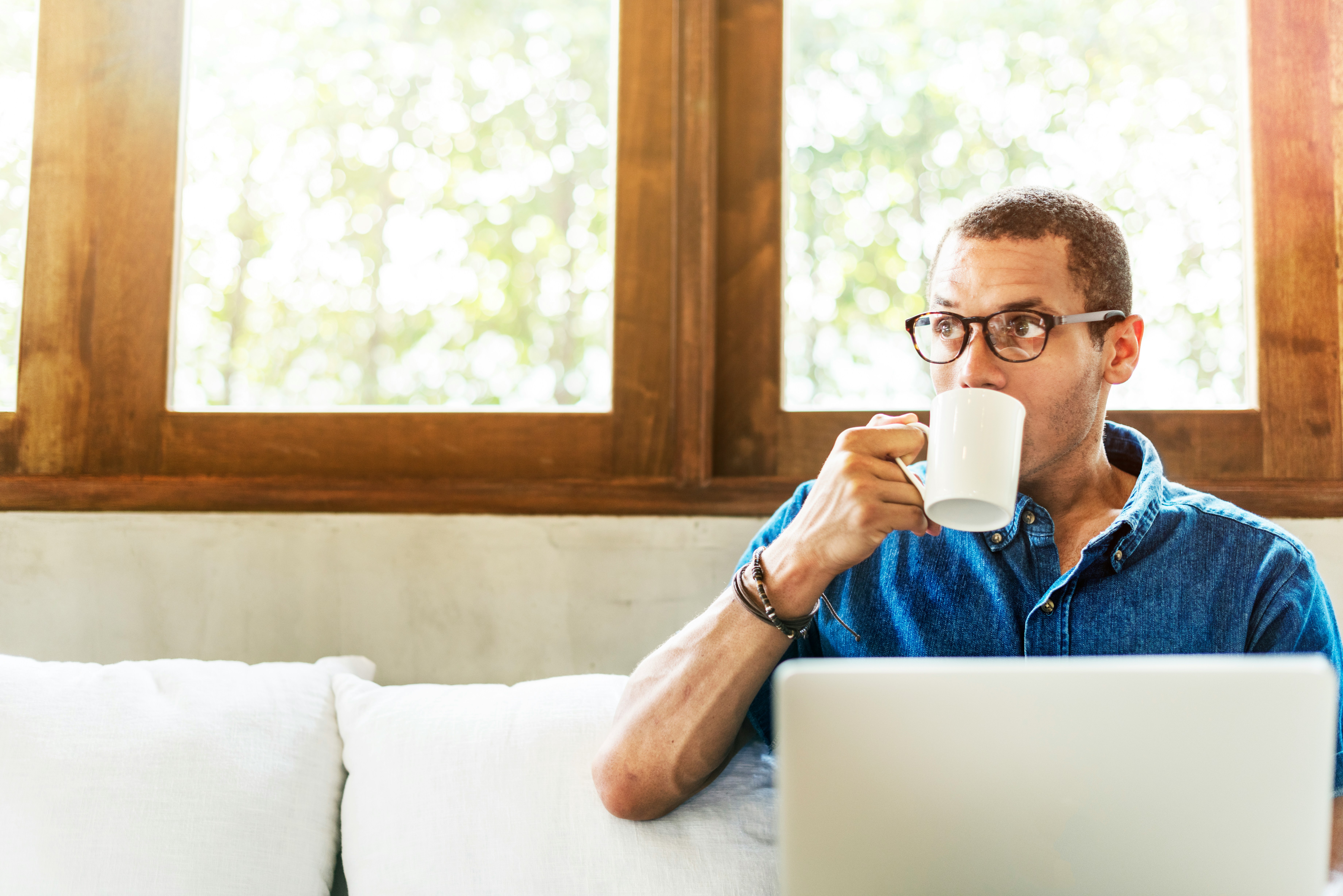 Man Sipping Coffee