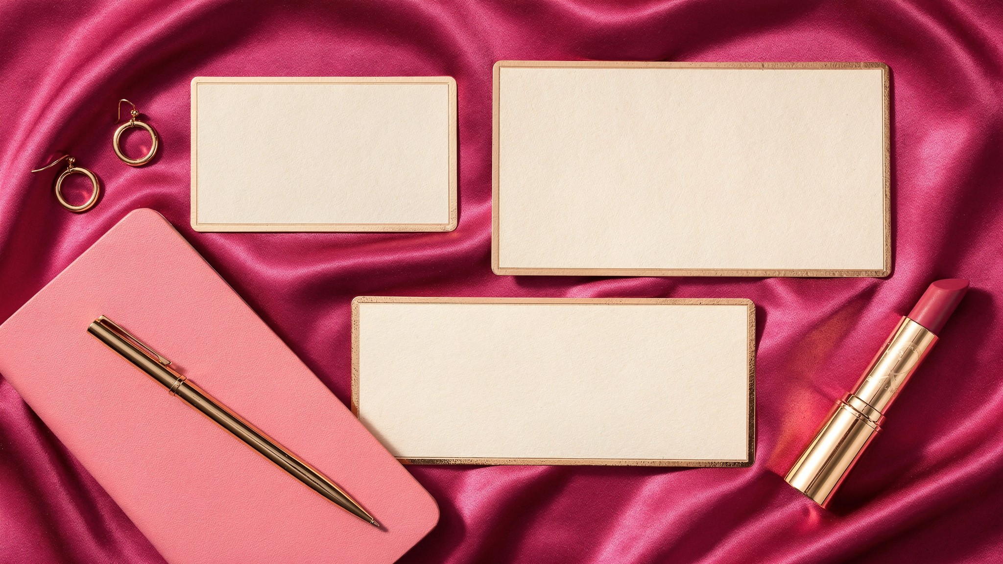 Flat lay of Instagram aspect ratio reference cards in pink and gold editorial styling