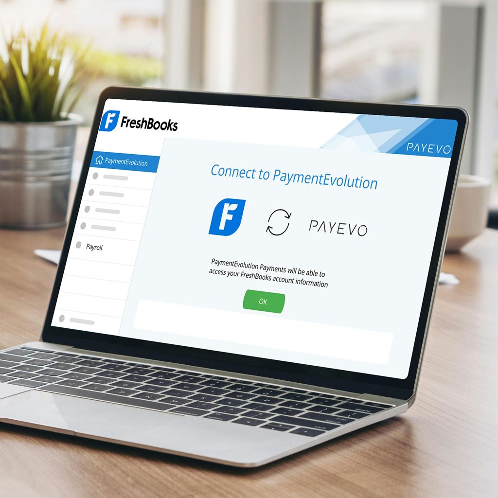Laptop screen showing FreshBooks connection authorization dialog for PaymentEvolution integration