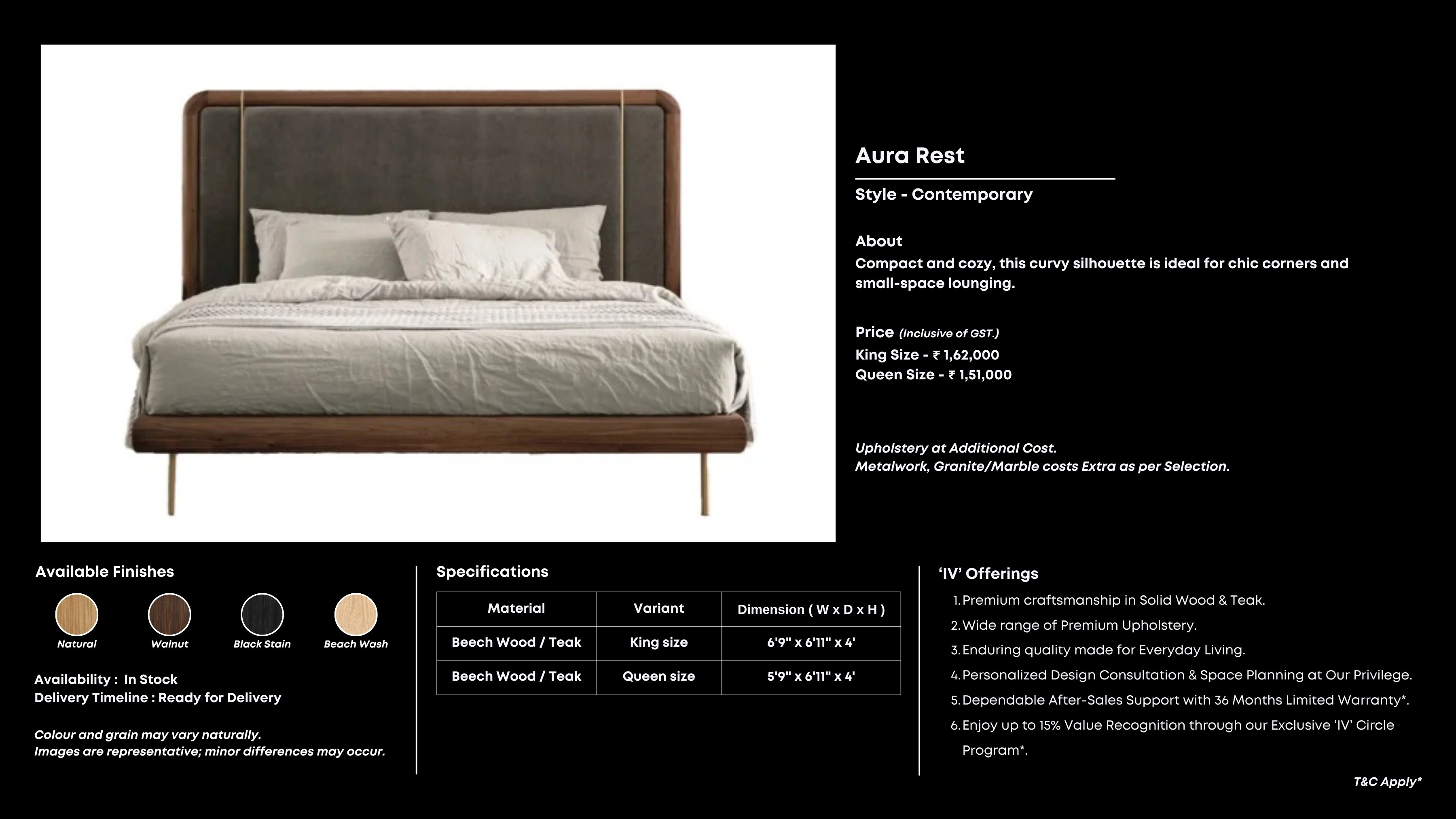 Dark fabric bed with wood frame and gold detailing.