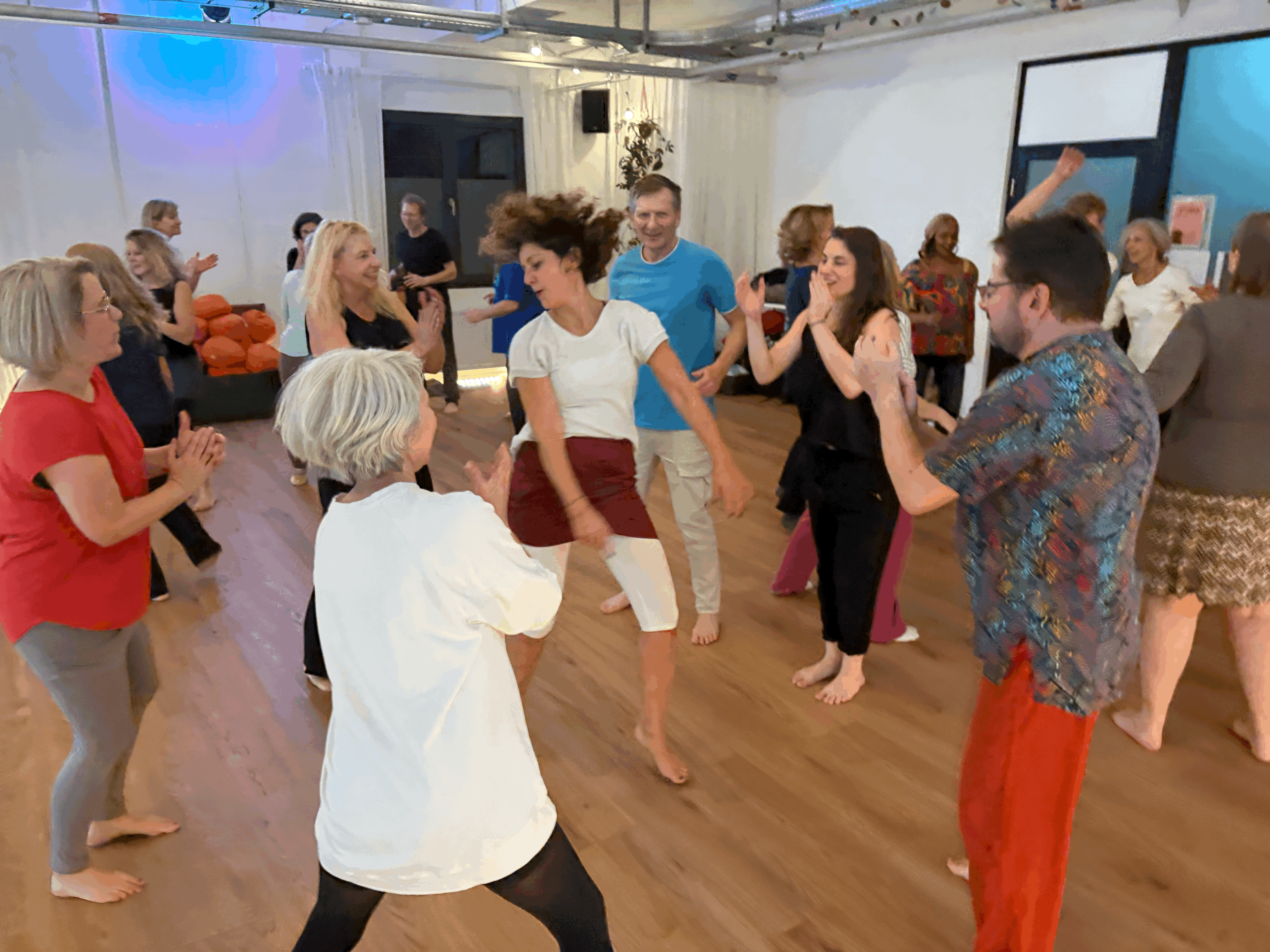 A cozy scene with warm sunlight casting stripes, featuring a potted plant and soft towels on a window sill.
