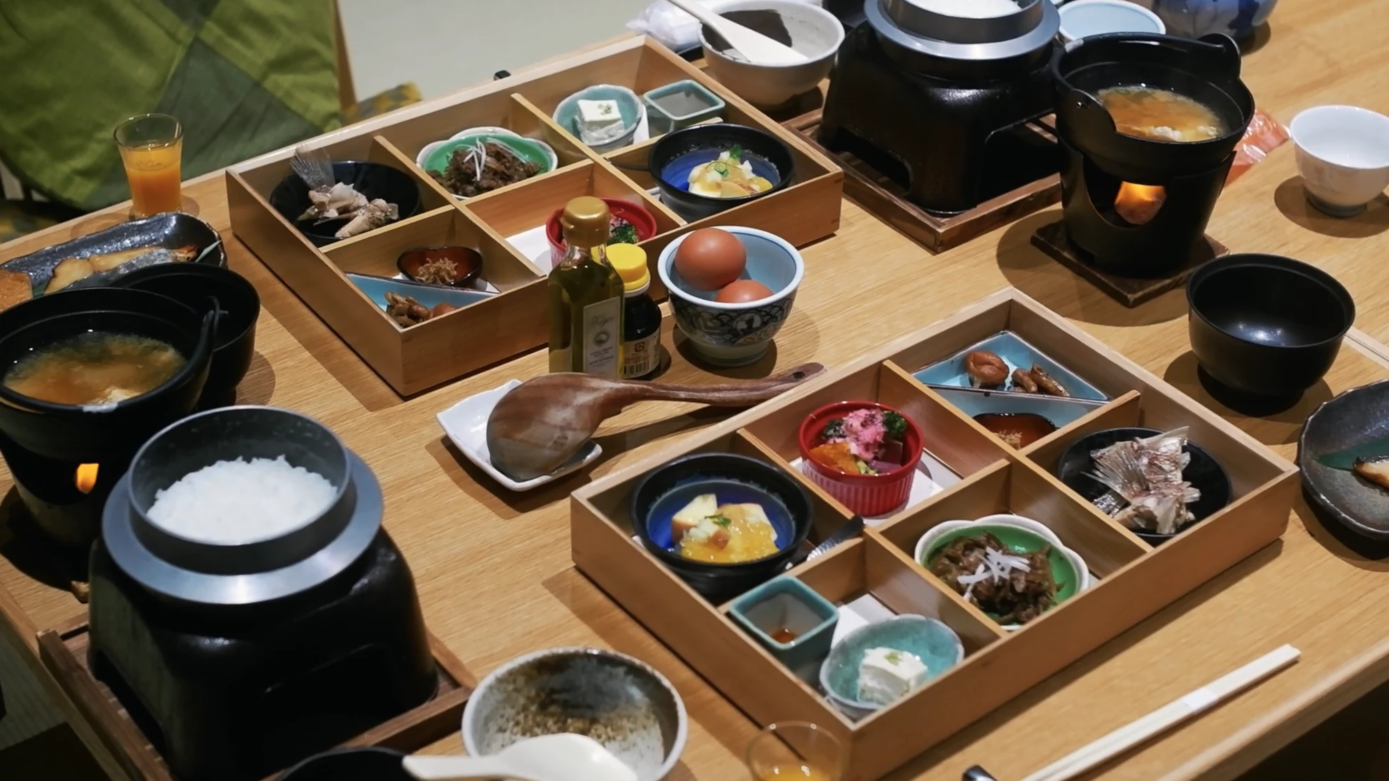 A lacquered breakfast tray in a Kinosaki inn with rice, miso soup and small seasonal dishes.