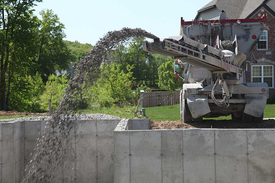 Photo of a truck shooting gravel