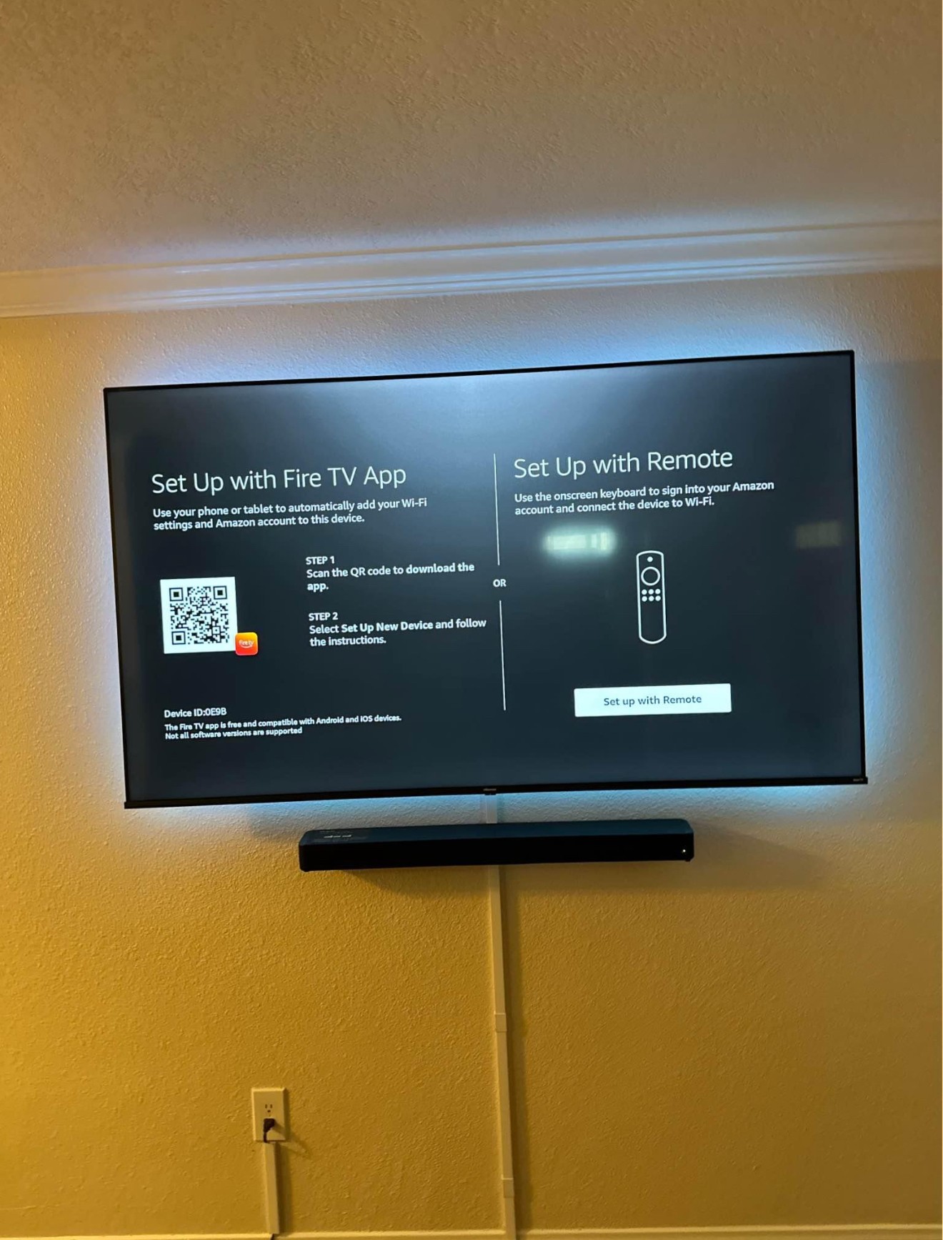 70-inch TV mounted using a standard wall mount setup in a residential home in Dallas, with clean wiring and a modern look.