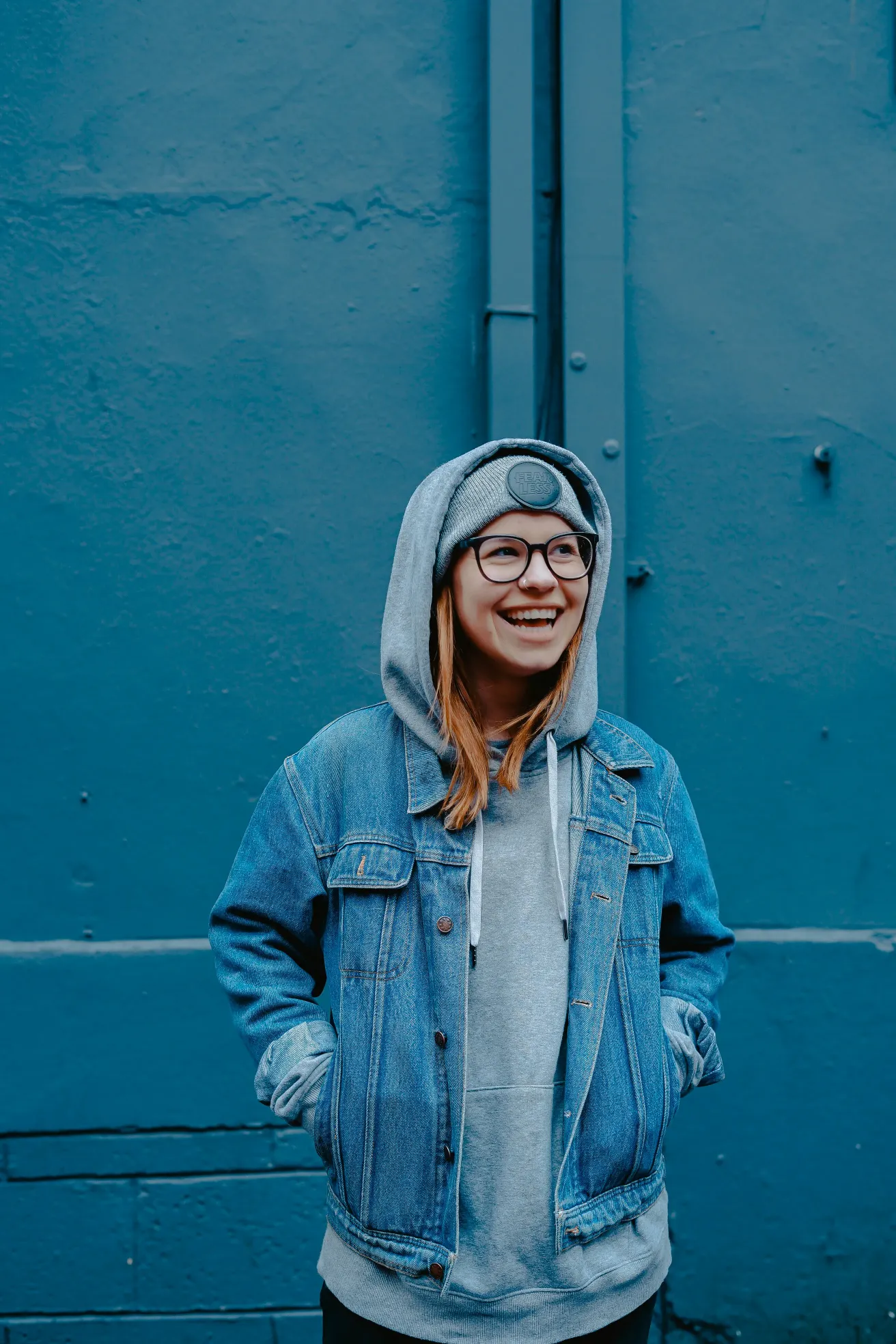 Teenager smiling outdoors, representing confidence, identity and emotional wellbeing in adolescence