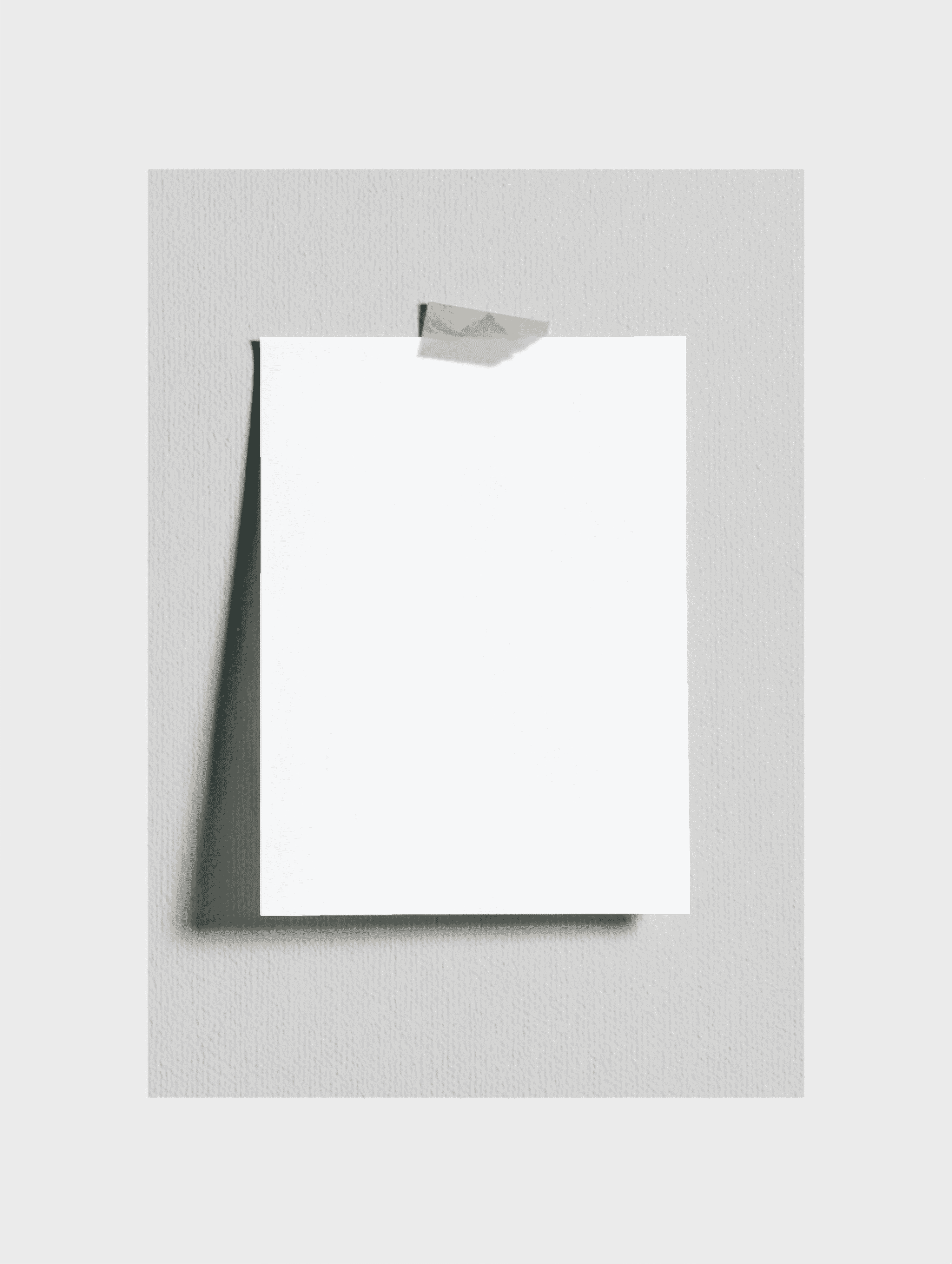 Minimal moodboard photo mockups taped against a neutral wall — available in one, three, and four-photo arrangements. Designed for creative direction boards and brand presentations, these mockups balance tactile realism with editorial composition. Each variation captures film-like texture, studio lighting, and subtle imperfections that give a human, crafted feel to digital design work.