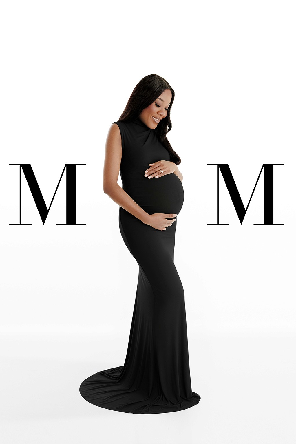 Minimalist maternity portrait in black dress — timeless and elegant look.