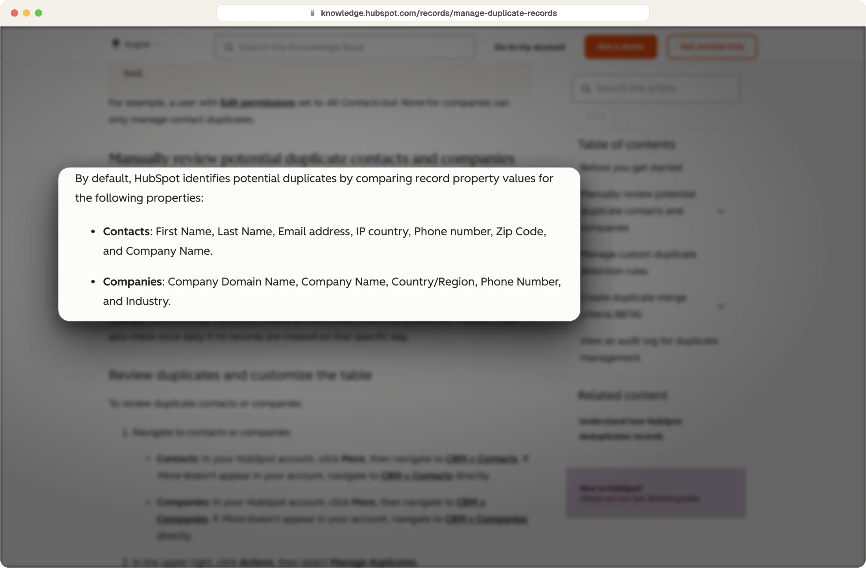 HubSpot duplicate manager comparing names, email, country, phone and company properties to find likely duplicates
