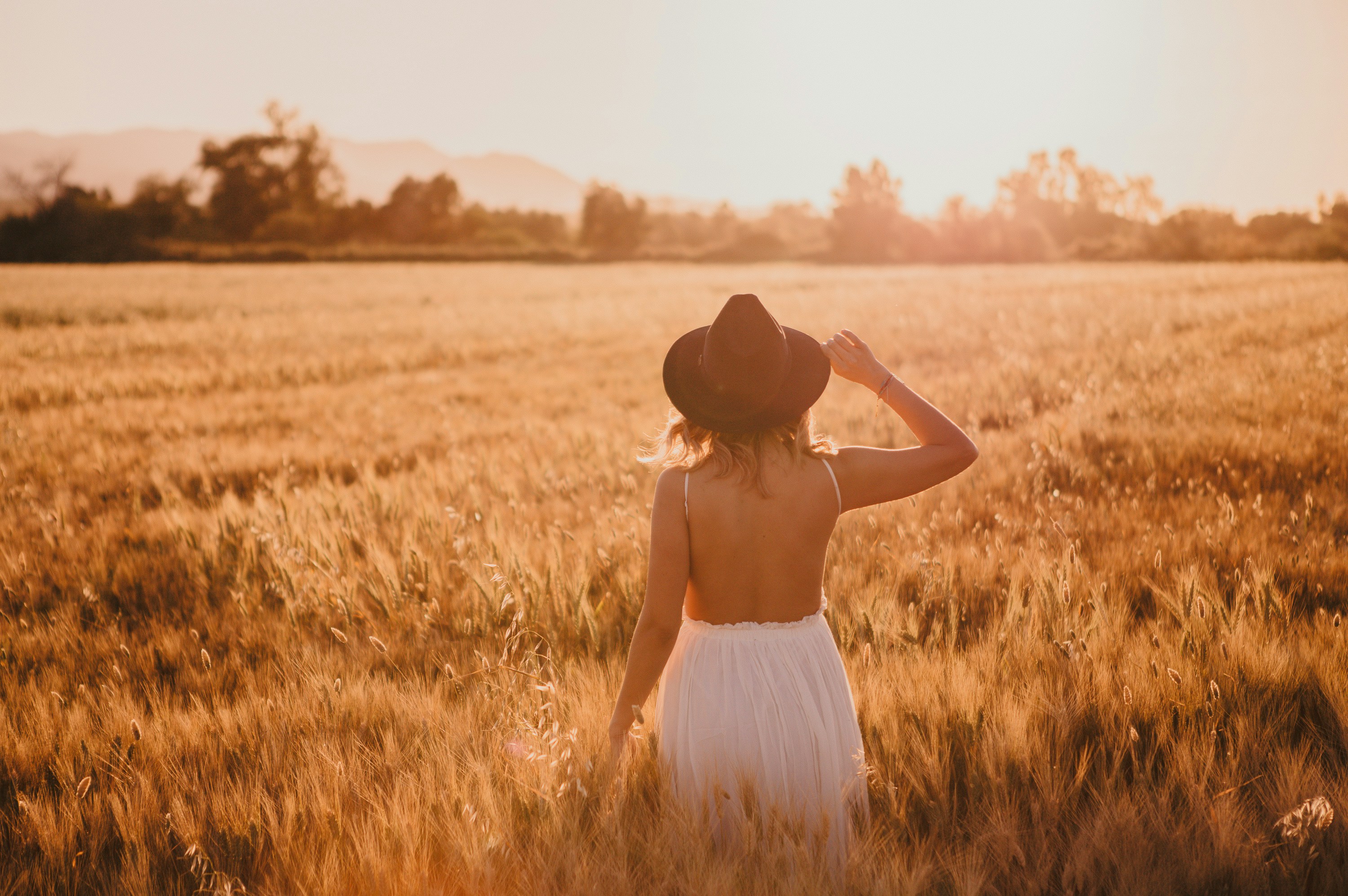 Lady Standing in Field-  Fall Winery Outfits