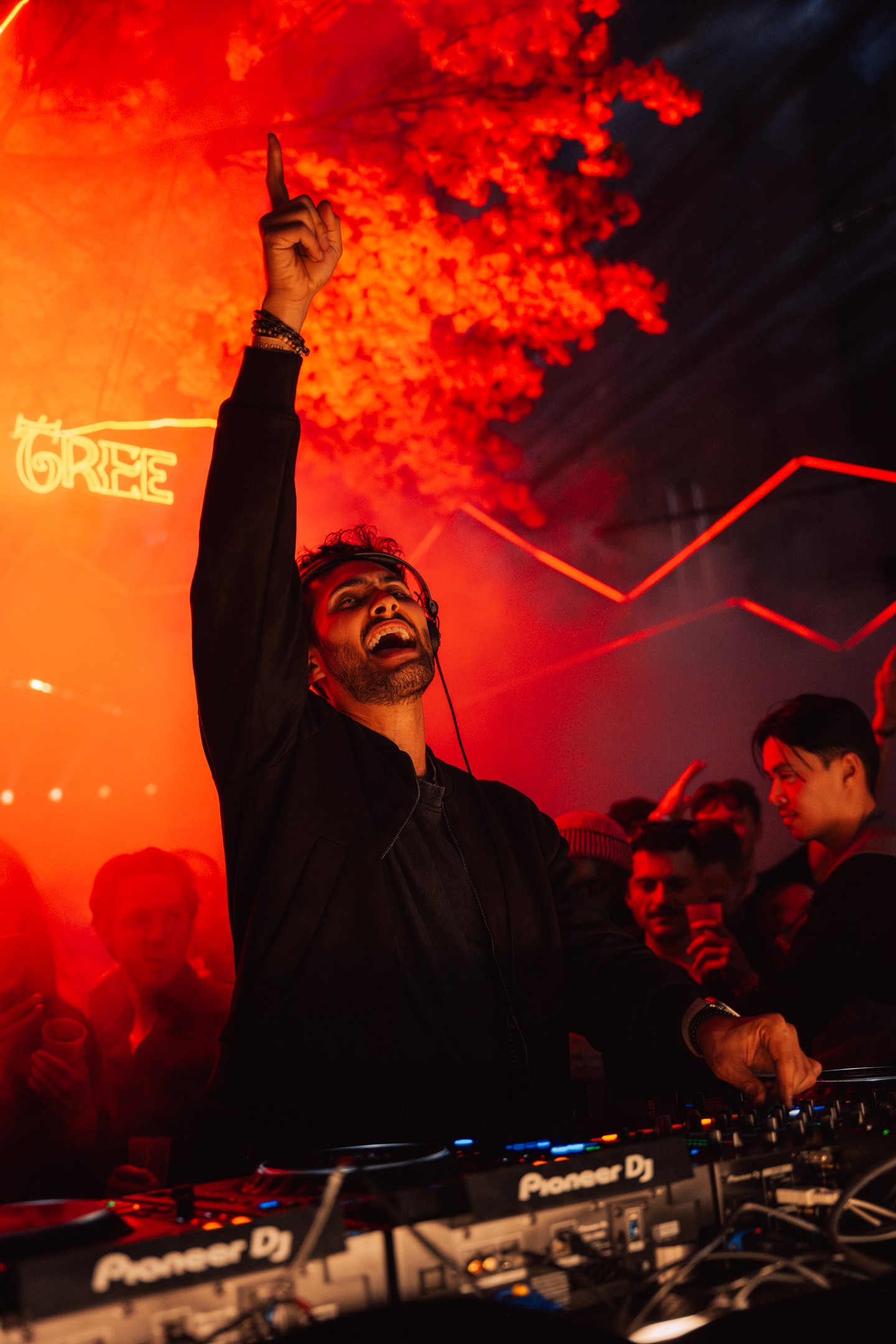 Fabio Massila on the DJ Booth of Red Tree Event designed by Daniel Klug