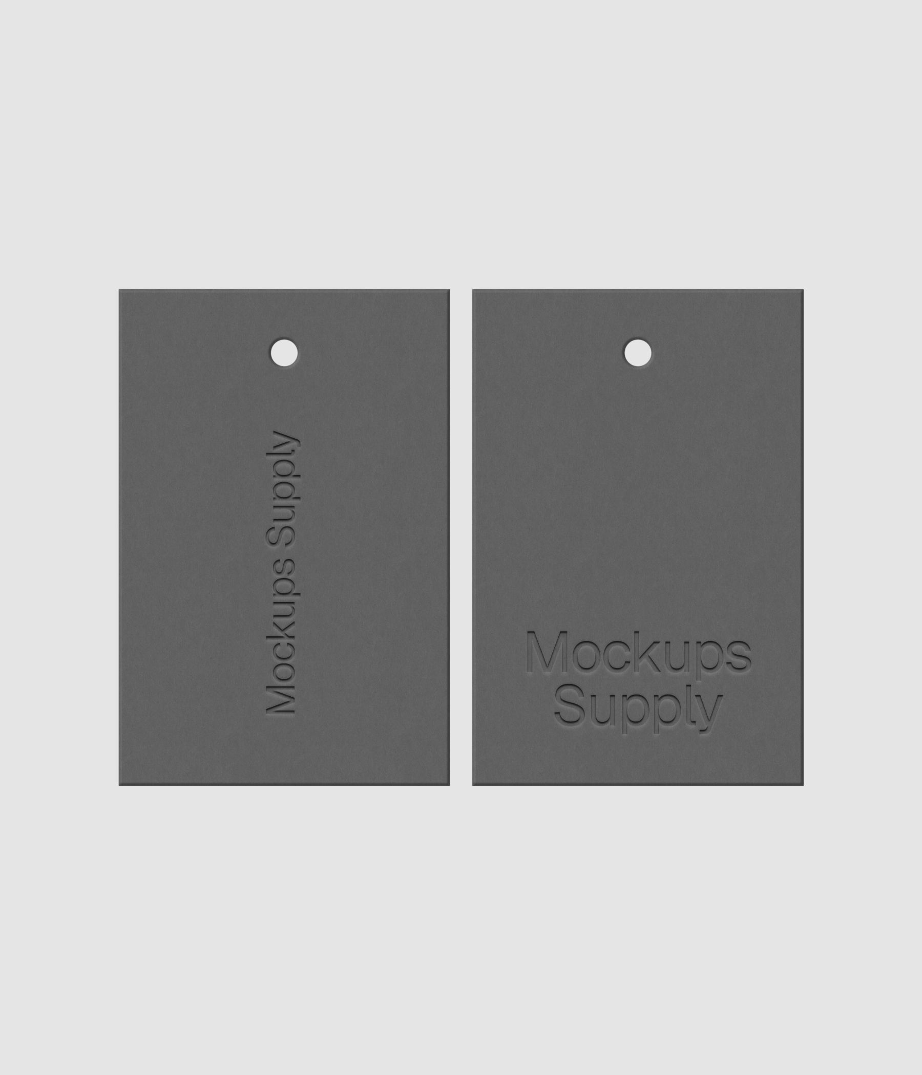 Two gray 2x3 hang tags mockup on white background with debossed logo effect and detailed paper texture for Photoshop download psd
