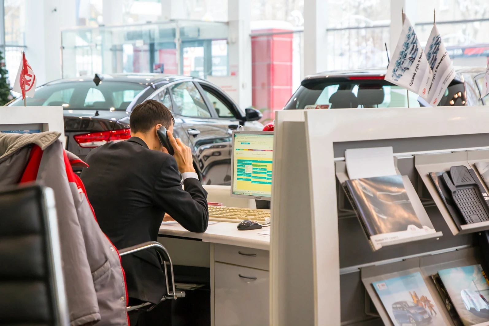 Russia, Kirov - December 05, 2016: Showroom and car KIA of dealership KIA-Zentr Kirov in Kirov city in 2016