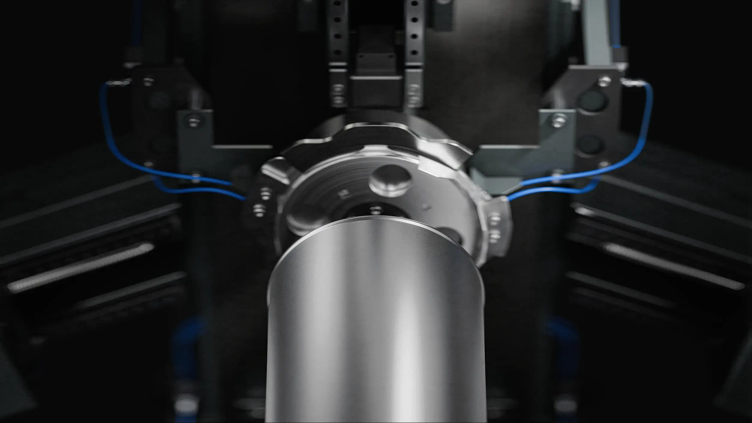 Close up of machine for serial production of custom tanks with visible tank during processing