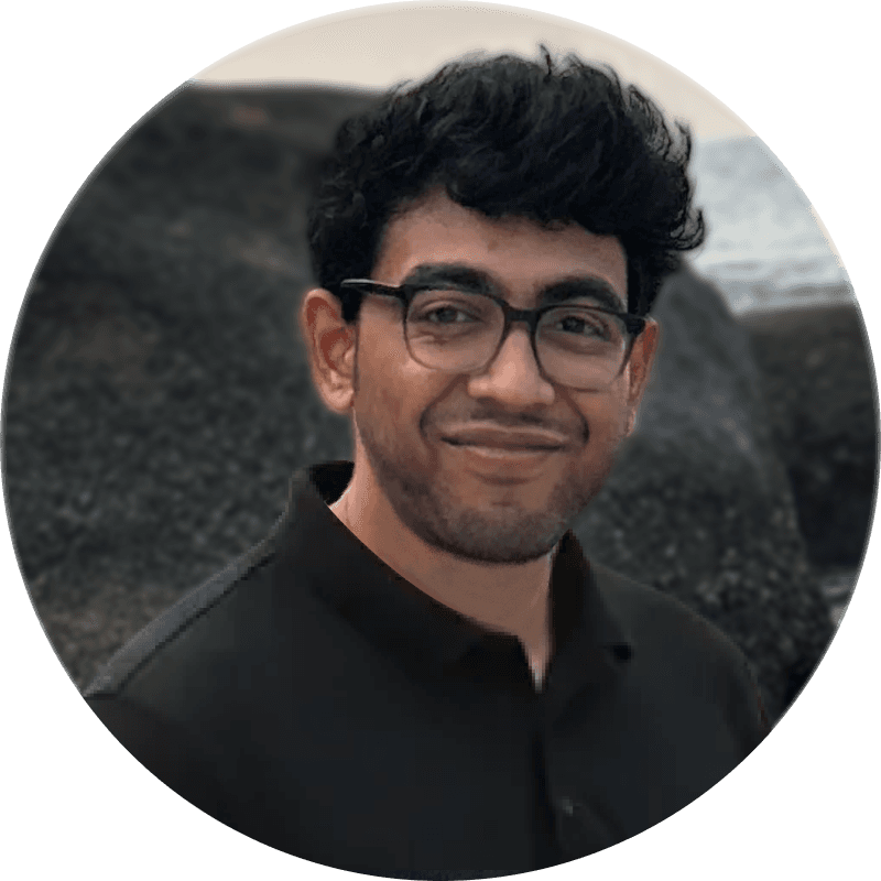 A photo of a man wearing a cap looking above