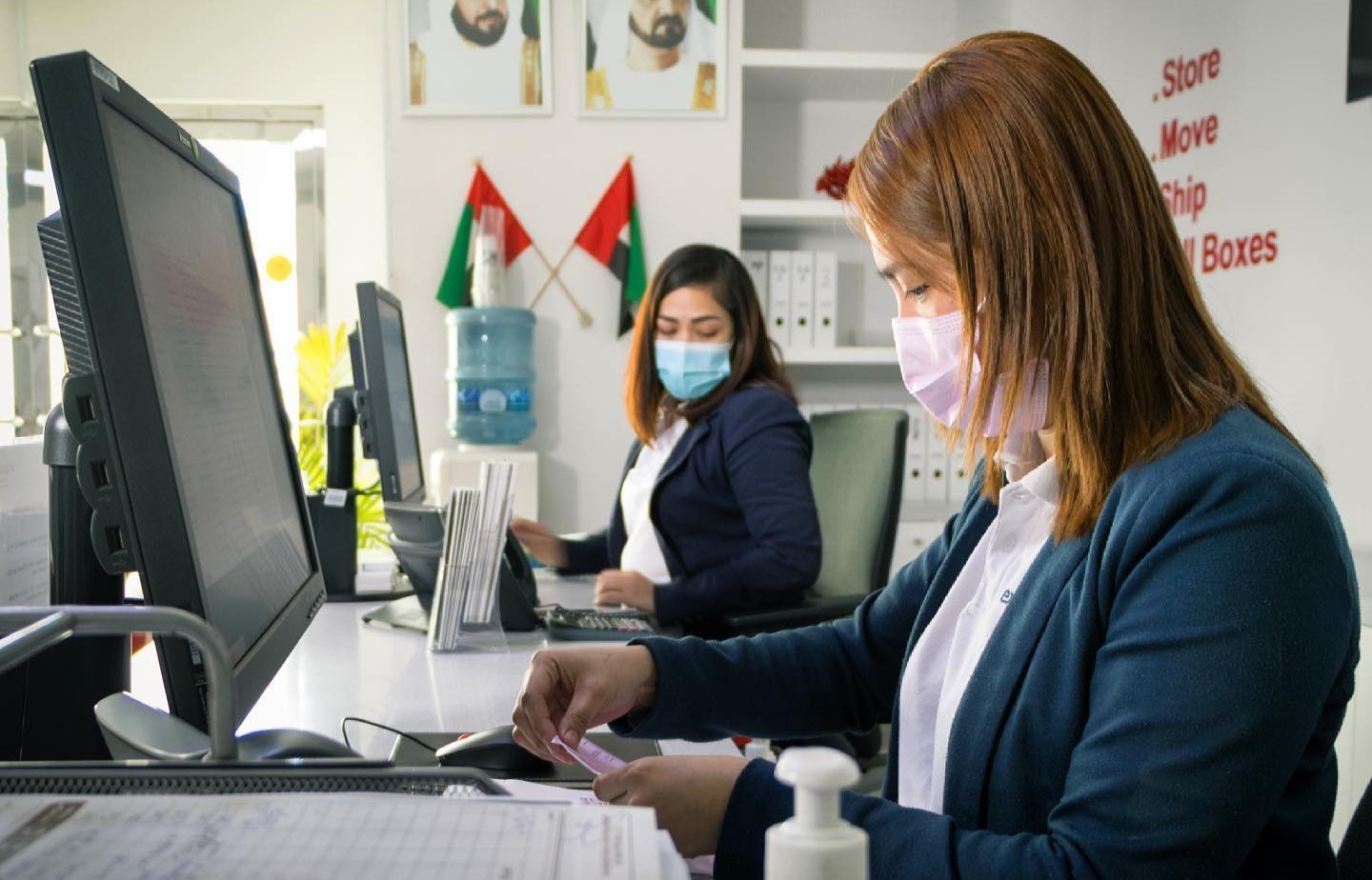 Employees ensuring fast and smooth Dubai Customs clearance