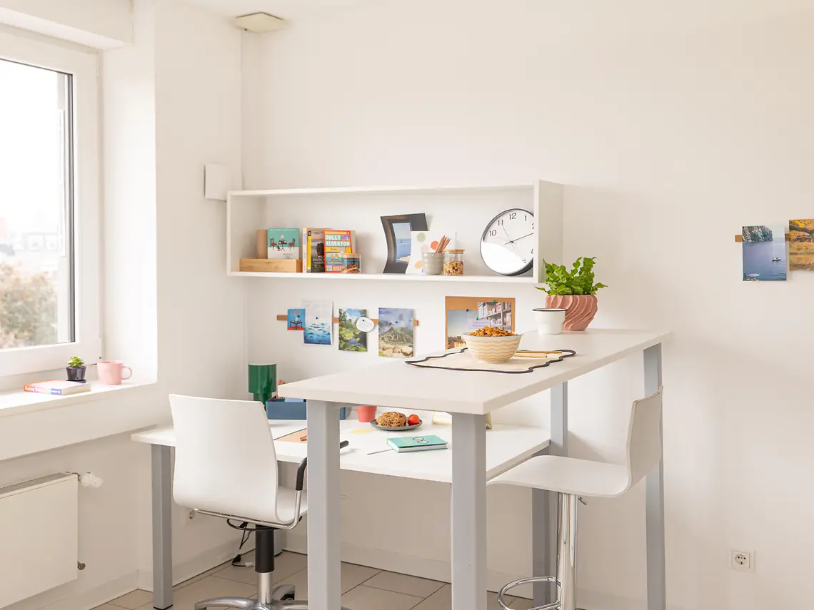 Study and dining area in a private student studio in Frankfurt