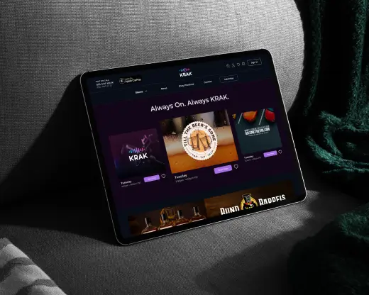 Krak media platform interface displayed on a tablet, showcasing the dark, modern UX/UI design.