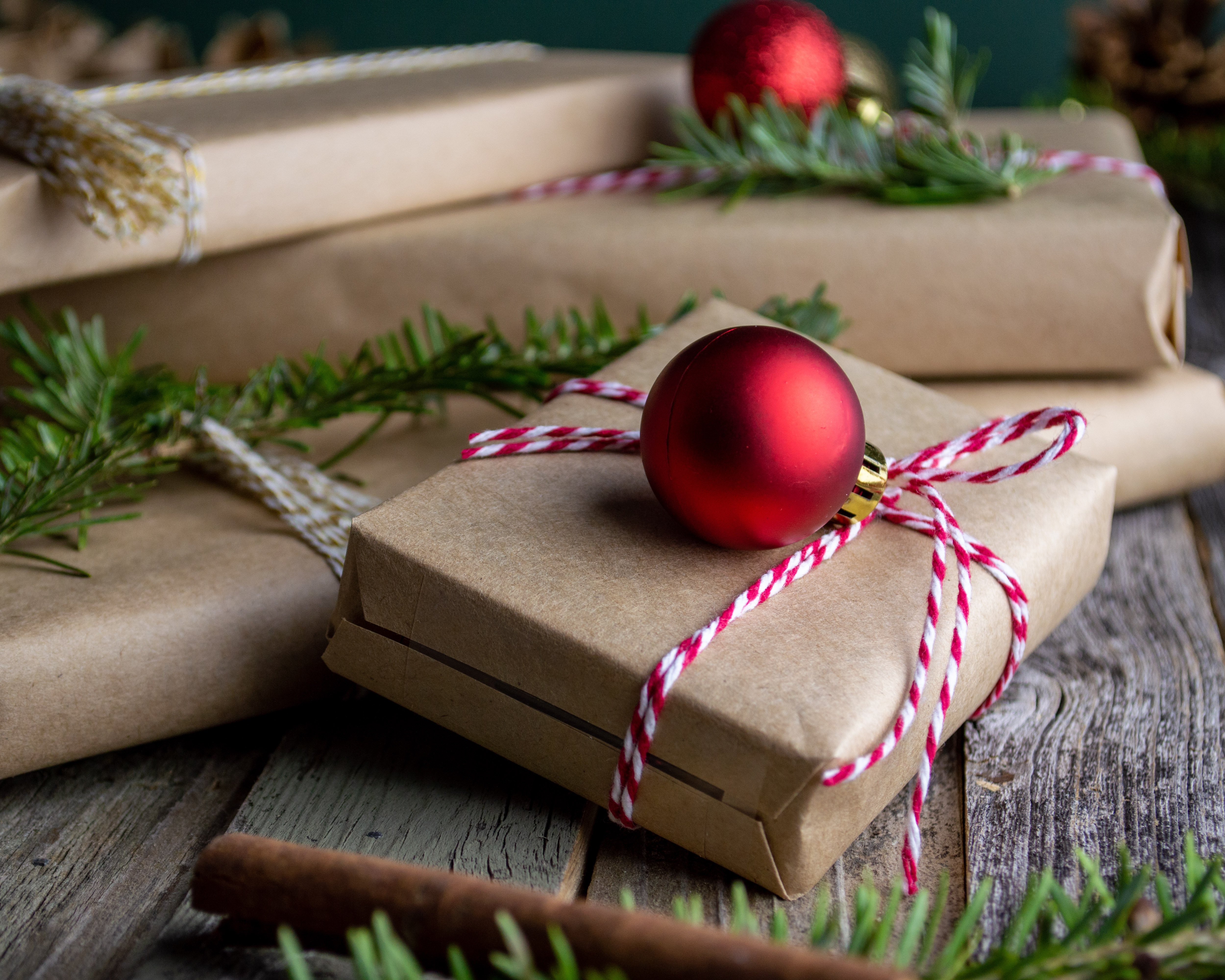 Simply wrapped presents under a Christmas tree