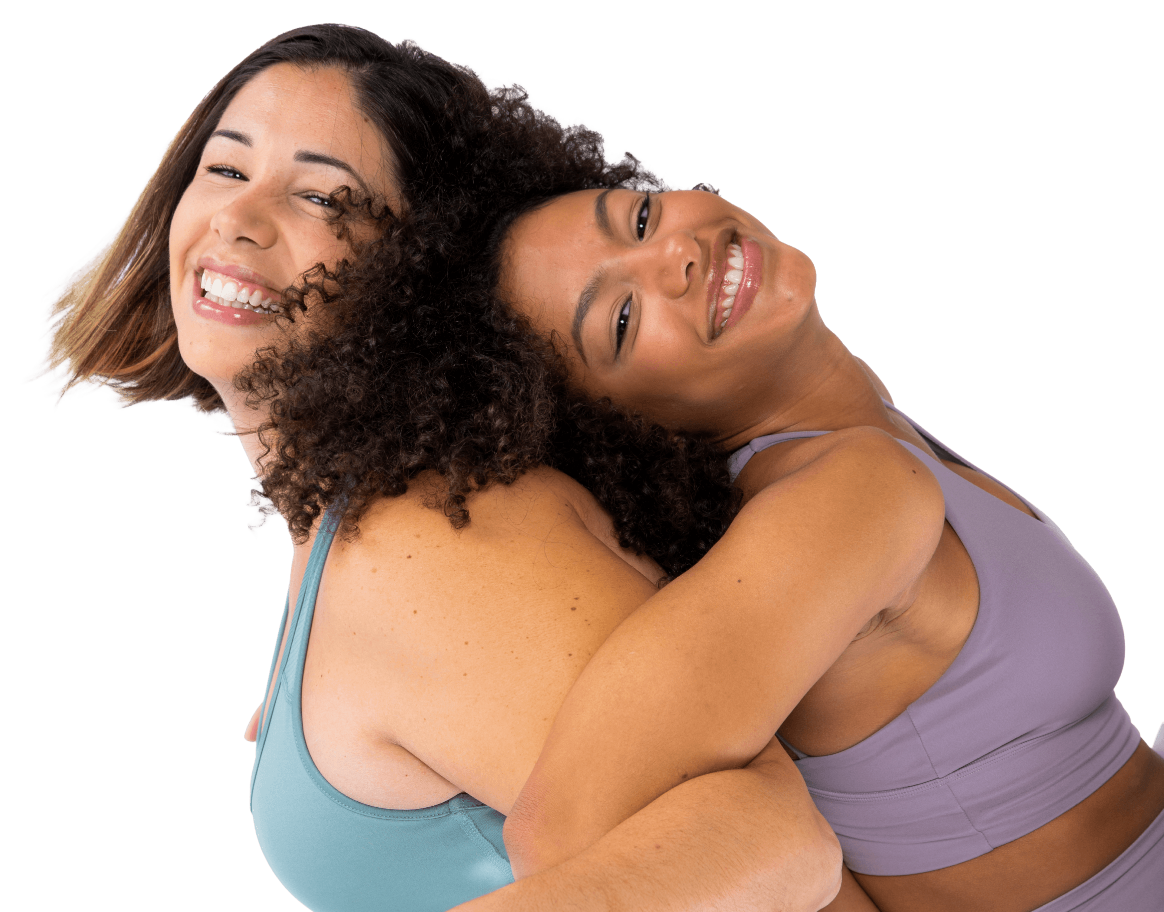 "Two women hugging in sports bras, blue and purple