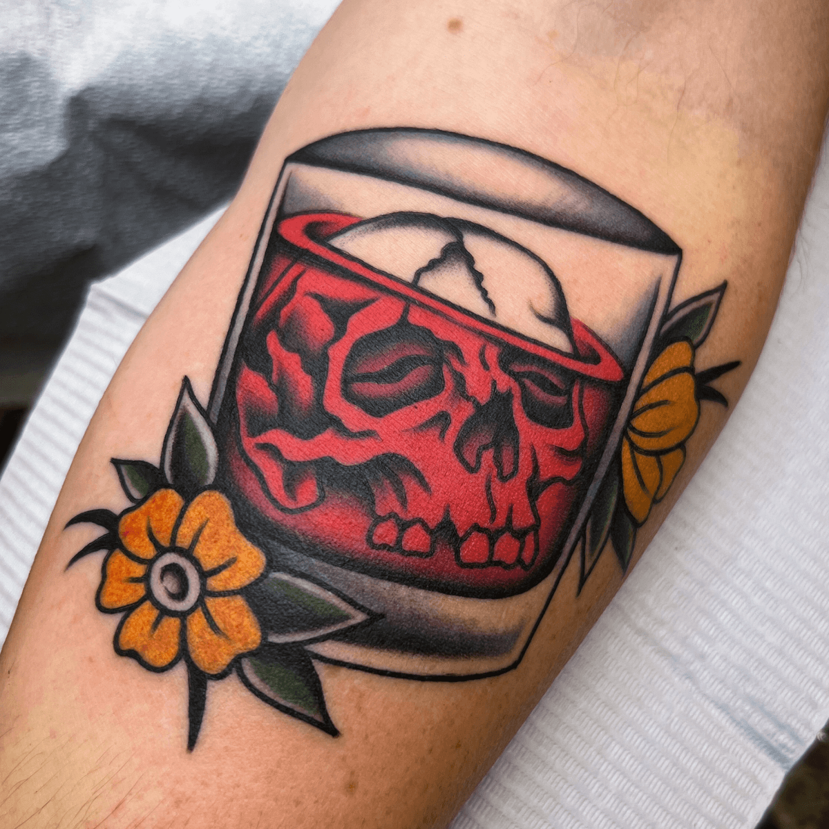 color tattoo of a skull in a cocktail glass