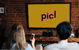 A decorative image of two people sitting on a couch and watching Picl content on a television screen. The TV displays the Picl logo in a full-screen splash screen format, indicating the start of the streaming service.