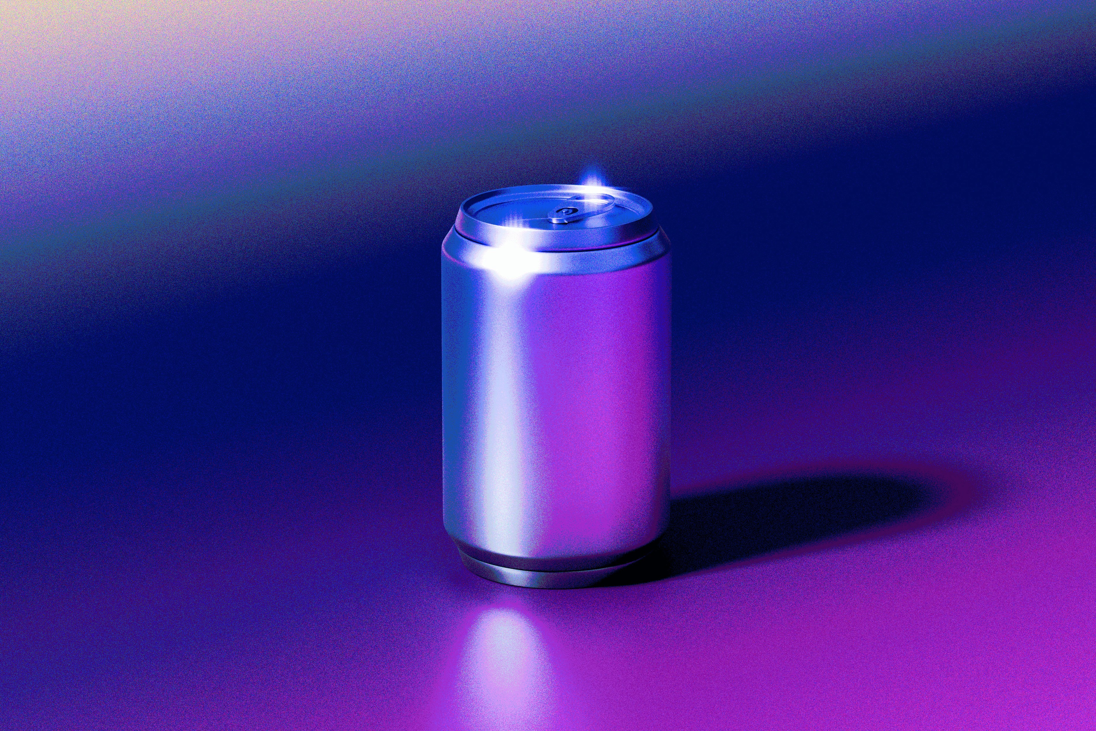 A metallic can sits on a colorful surface.