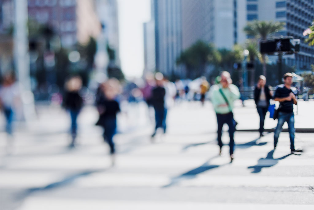 A photo of people in a built up area