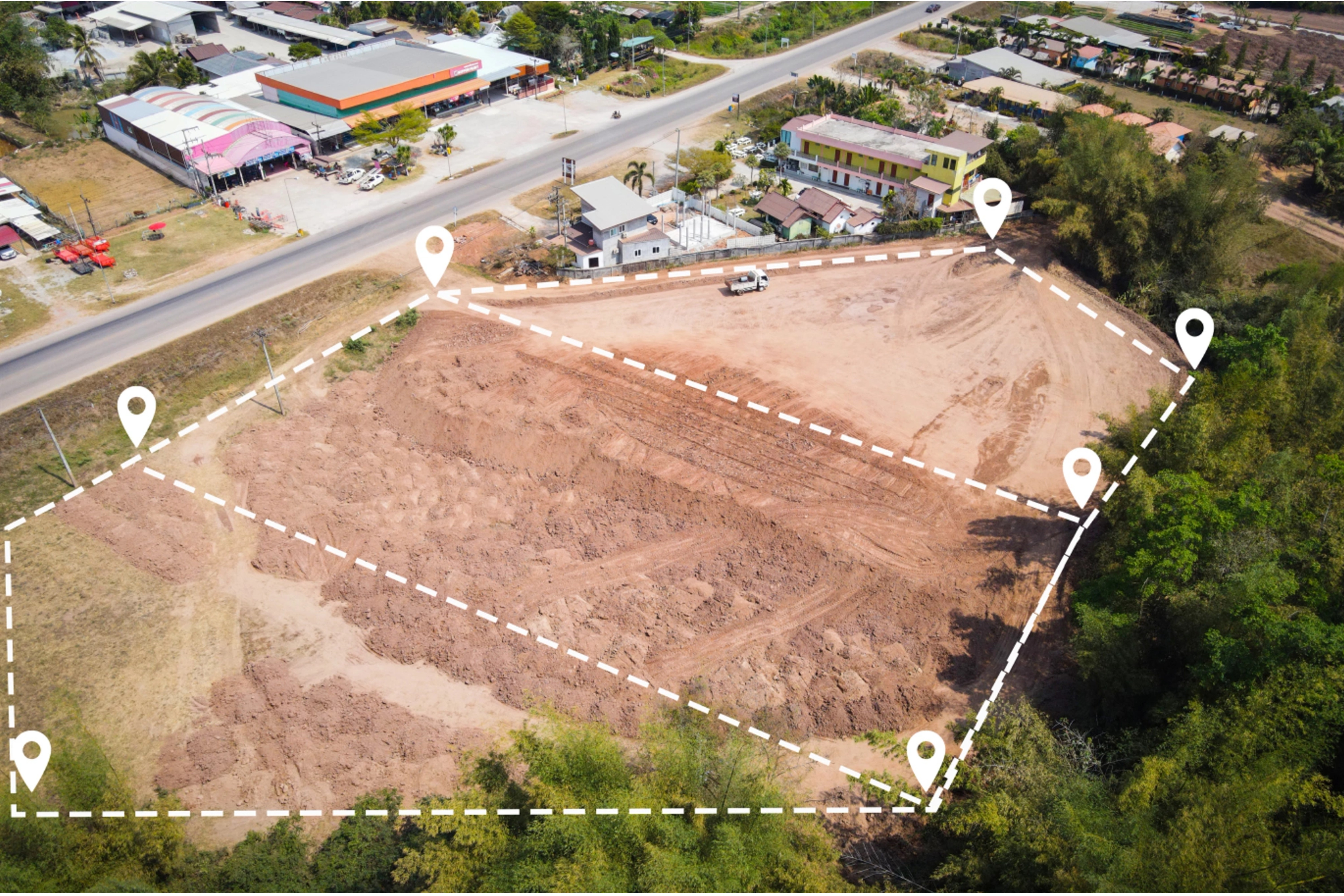 two people looking at a tablet and smiling