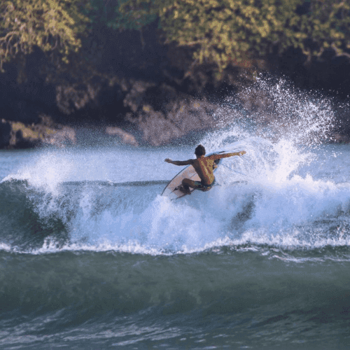 Surfer riding a wave with skill and precision – surfboard rental in playa-venao