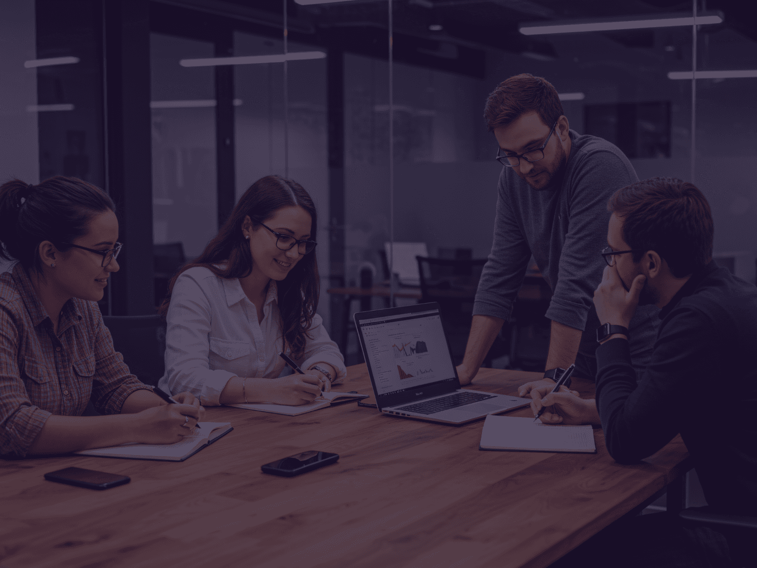crowd of people sitting on chairs inside room