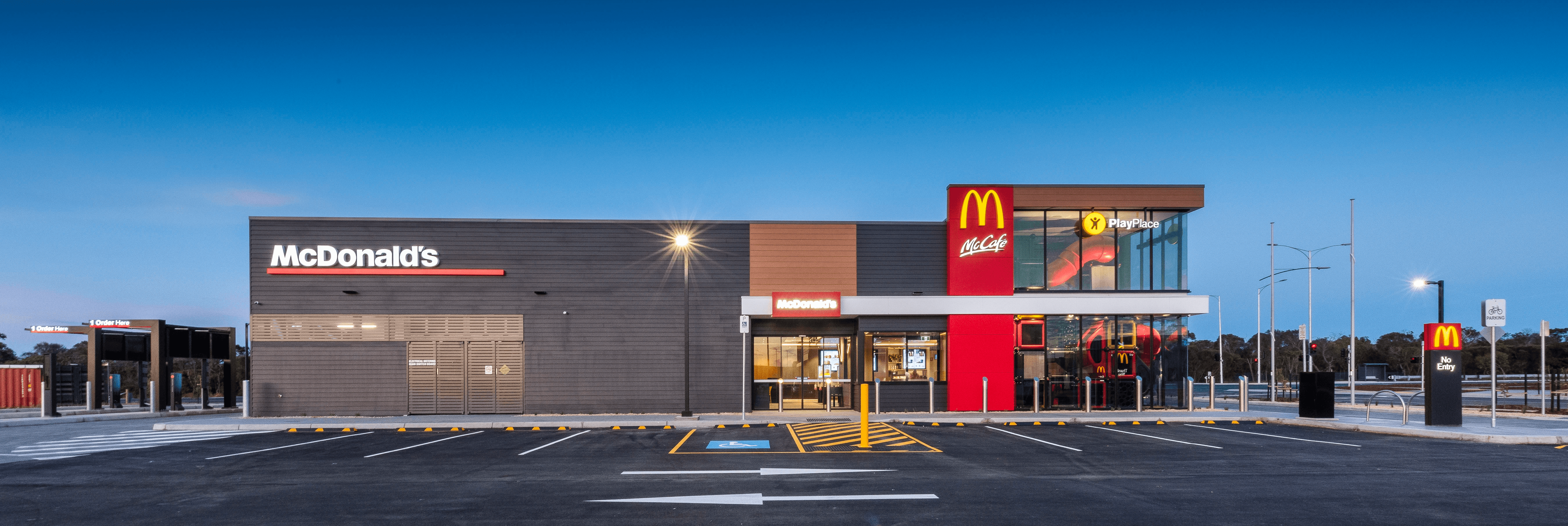 Geometric wooden wall panels with angled shapes and warm highlights.