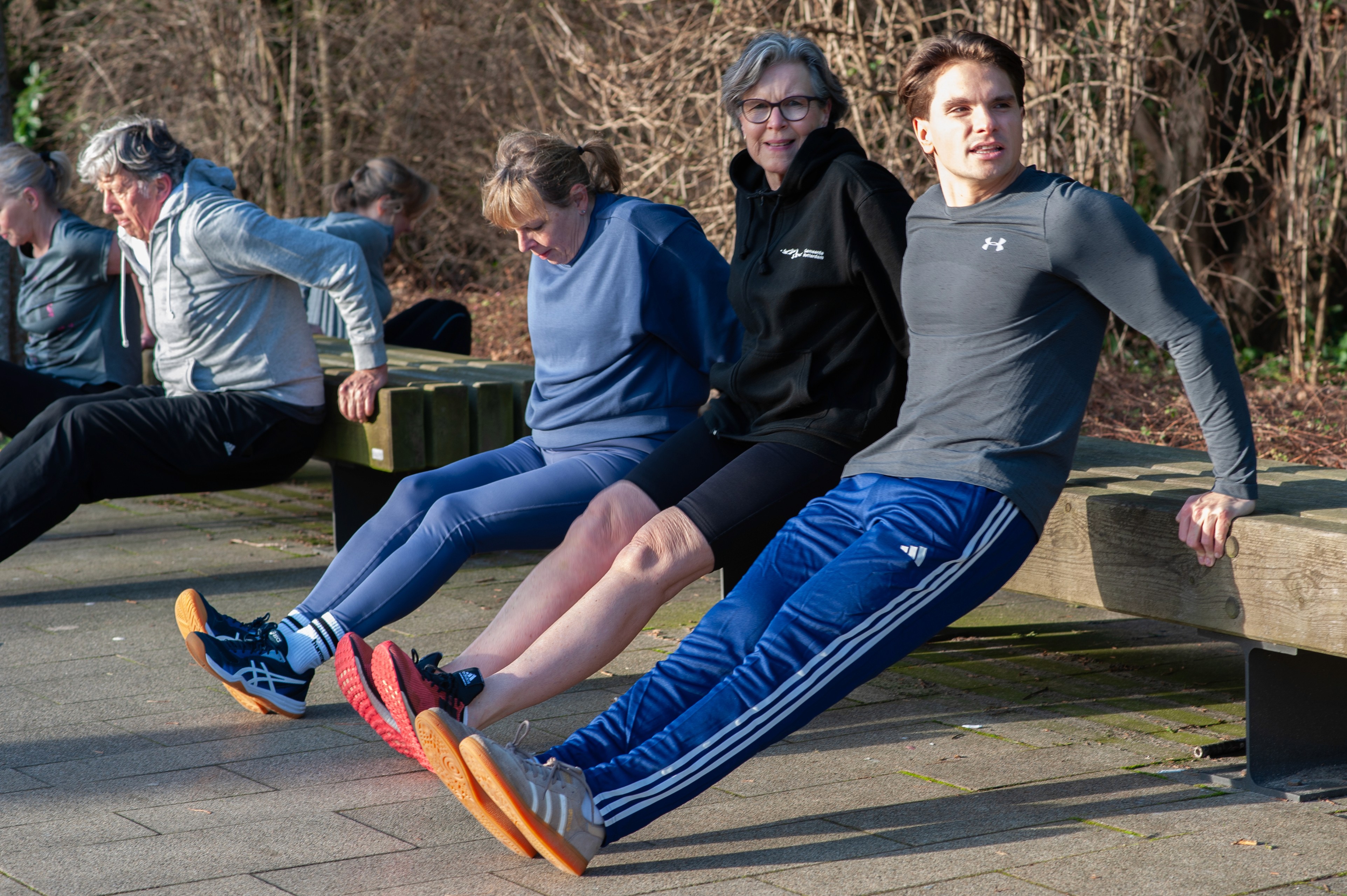 Rachel Stone, personal trainer and fitness coach, smiling in natural light