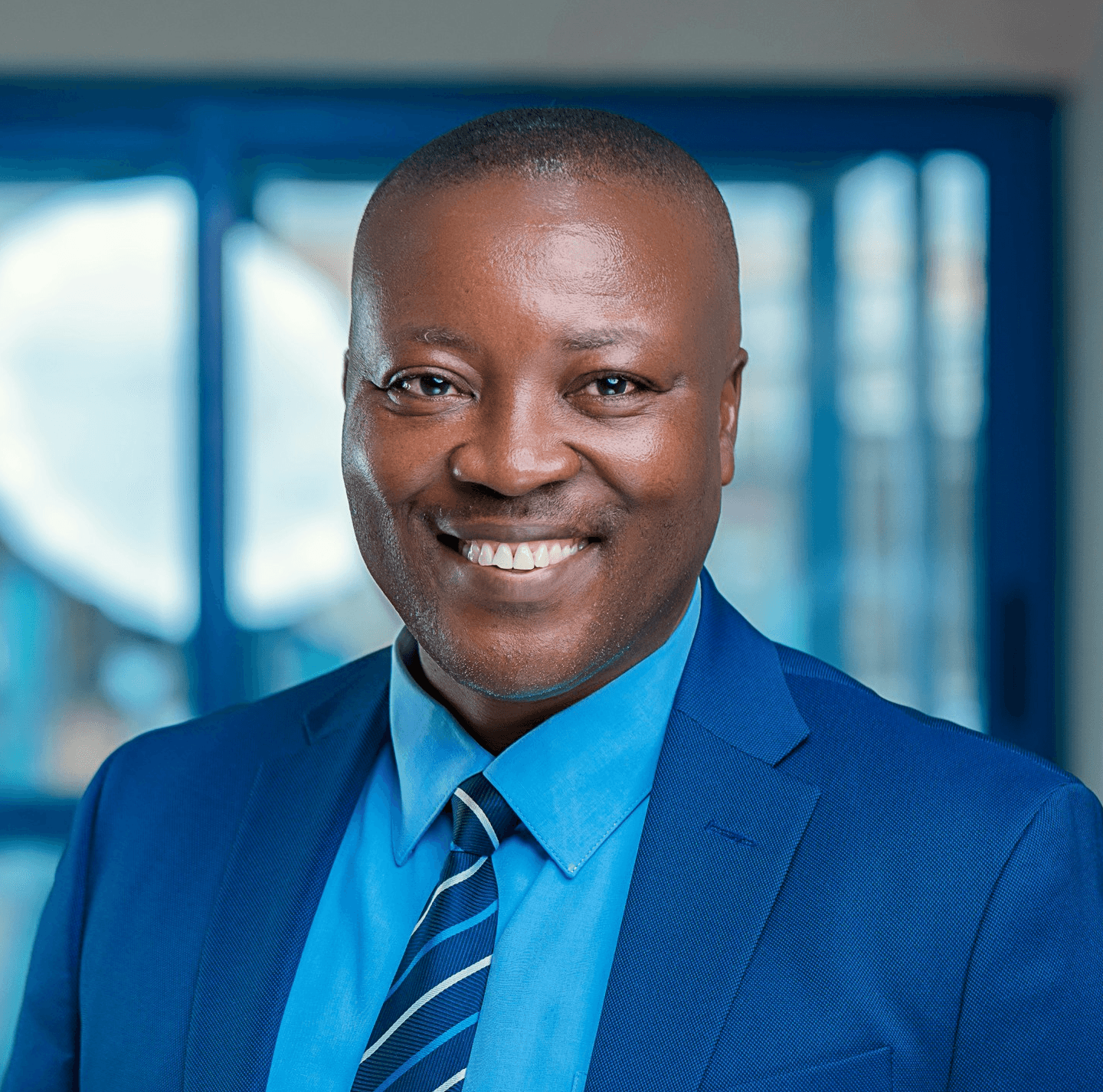 a man in a blue suit