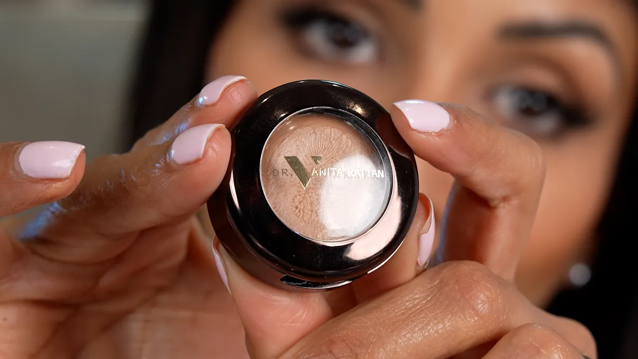 Branded skincare product revealed on camera during promotional Instagram video production with close up detail.