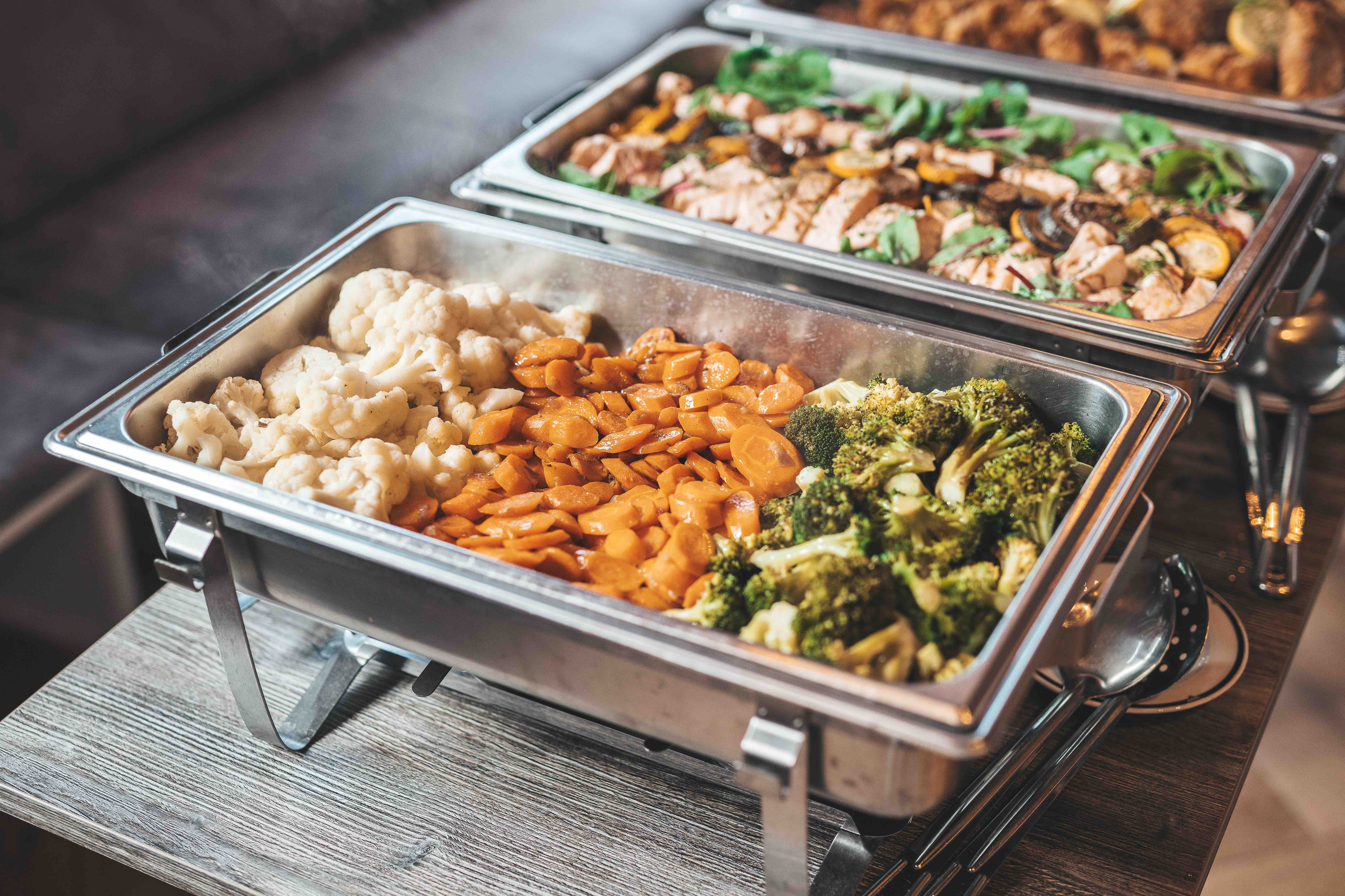 modern open lounge with palm trees outside